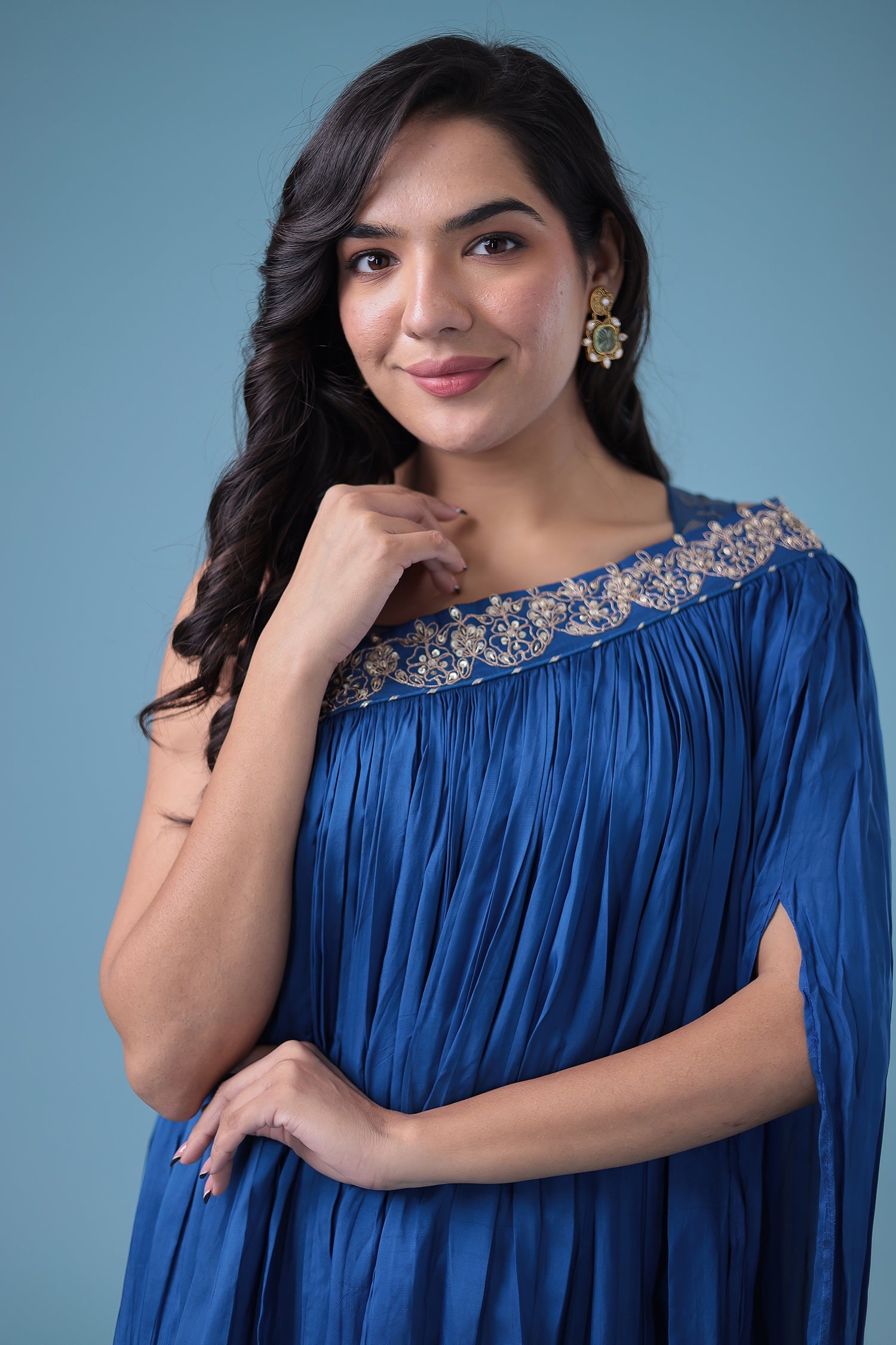 Exquisite Crop Top with Palazzo and a Draping Skirt Embellished with Zari and Dori work