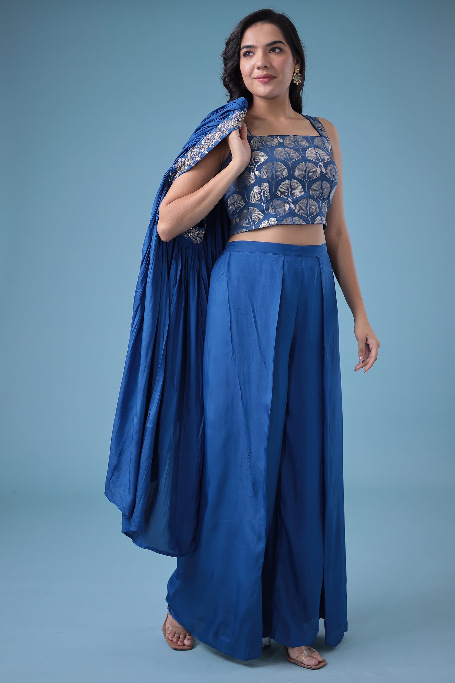 Exquisite Crop Top with Palazzo and a Draping Skirt Embellished with Zari and Dori work