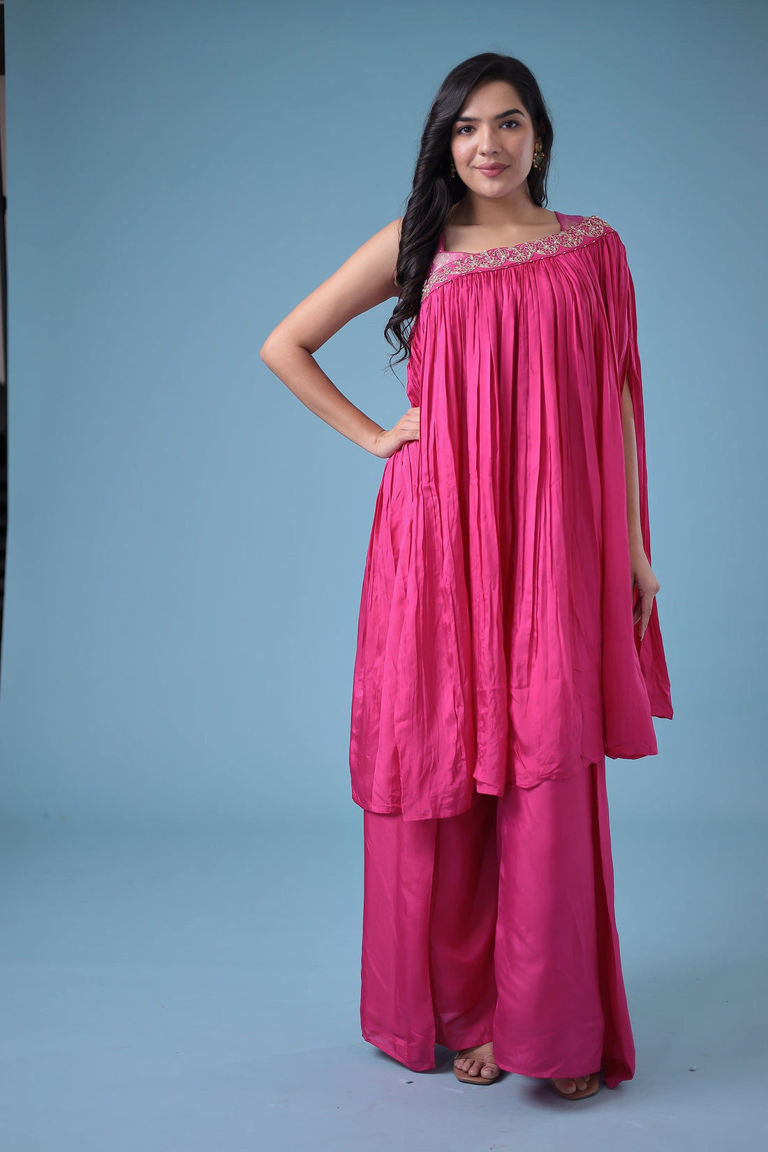 Exquisite Crop Top with Palazzo and a Draping Skirt Embellished with Zari and Dori work