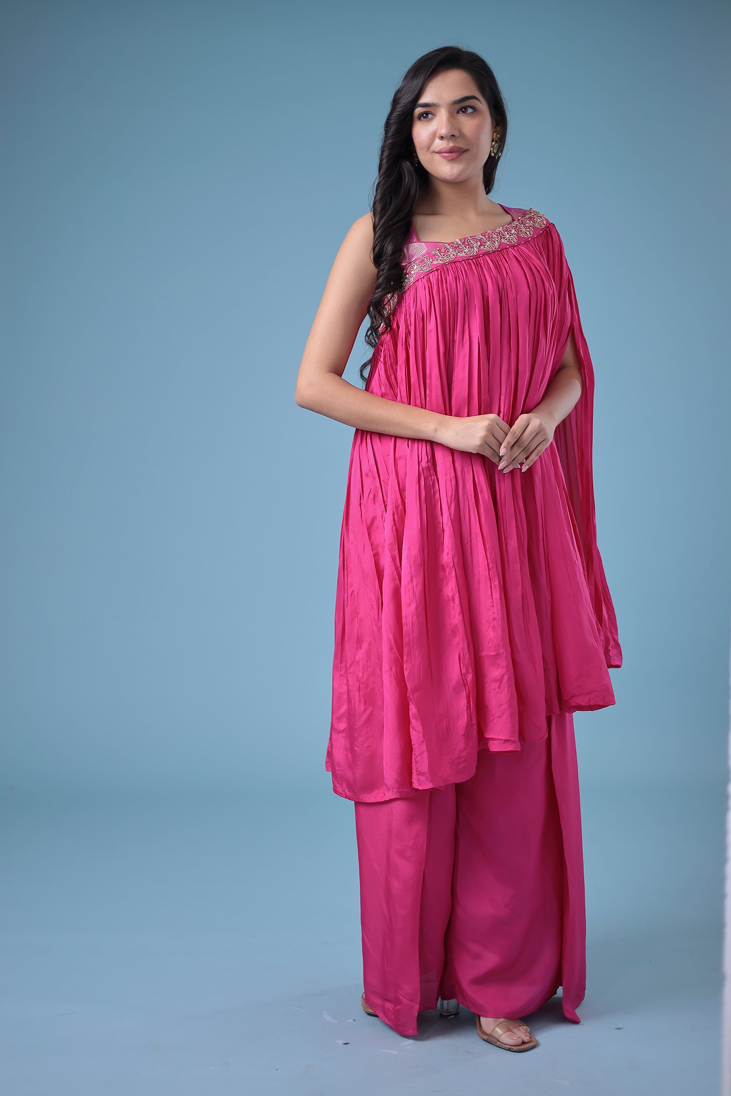 Exquisite Crop Top with Palazzo and a Draping Skirt Embellished with Zari and Dori work