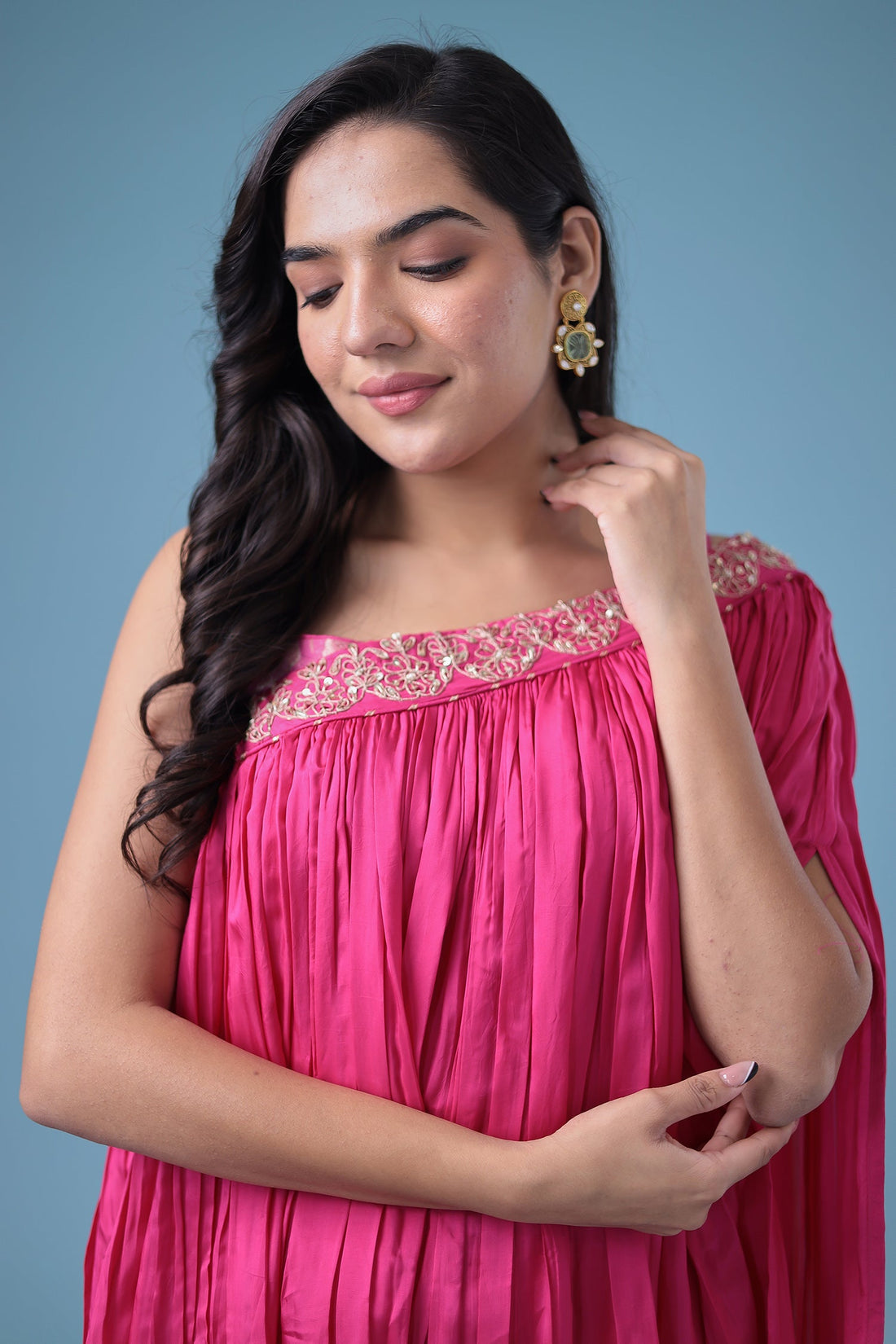 Exquisite Crop Top with Palazzo and a Draping Skirt Embellished with Zari and Dori work