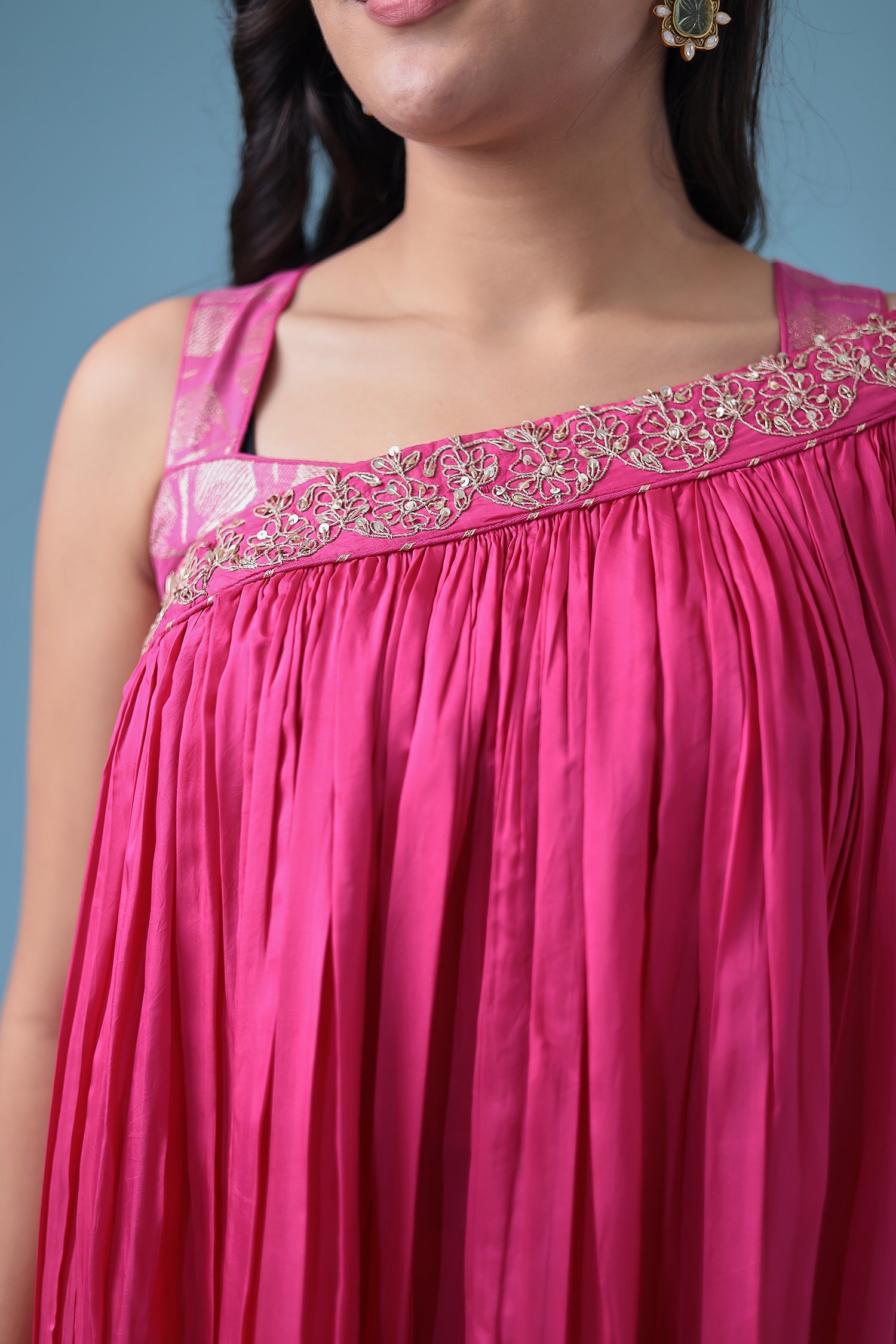 Exquisite Crop Top with Palazzo and a Draping Skirt Embellished with Zari and Dori work