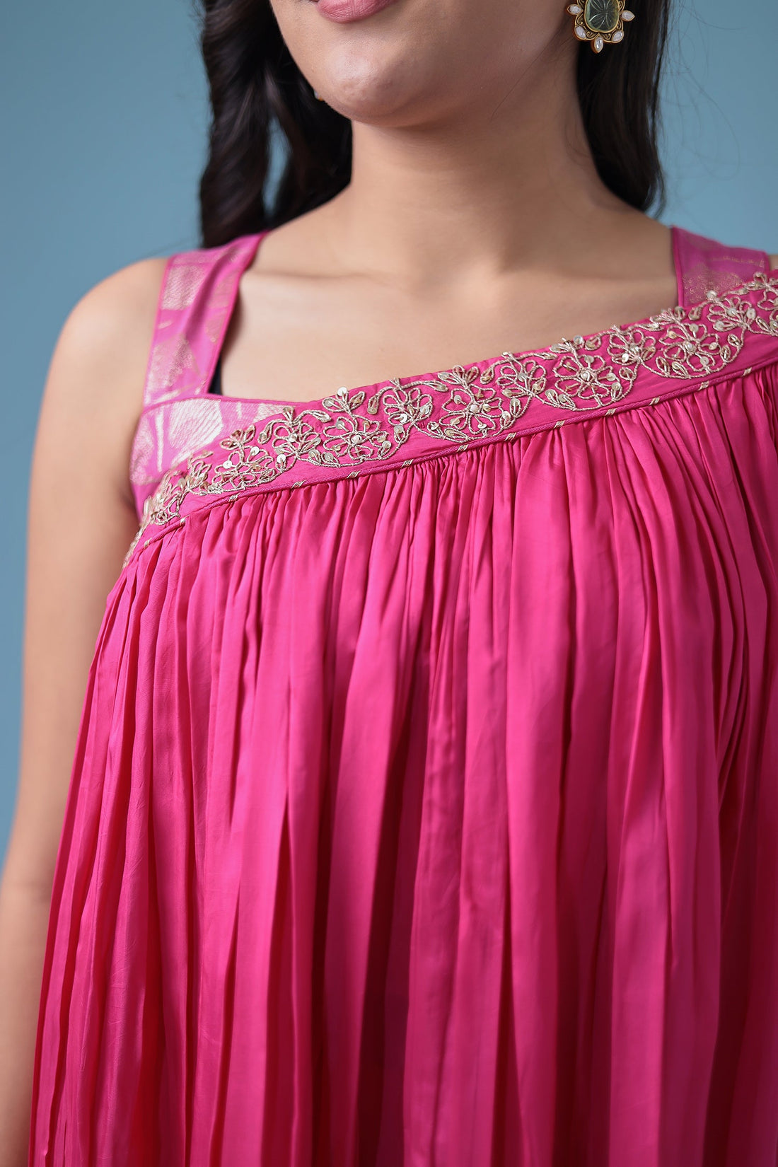 Exquisite Crop Top with Palazzo and a Draping Skirt Embellished with Zari and Dori work