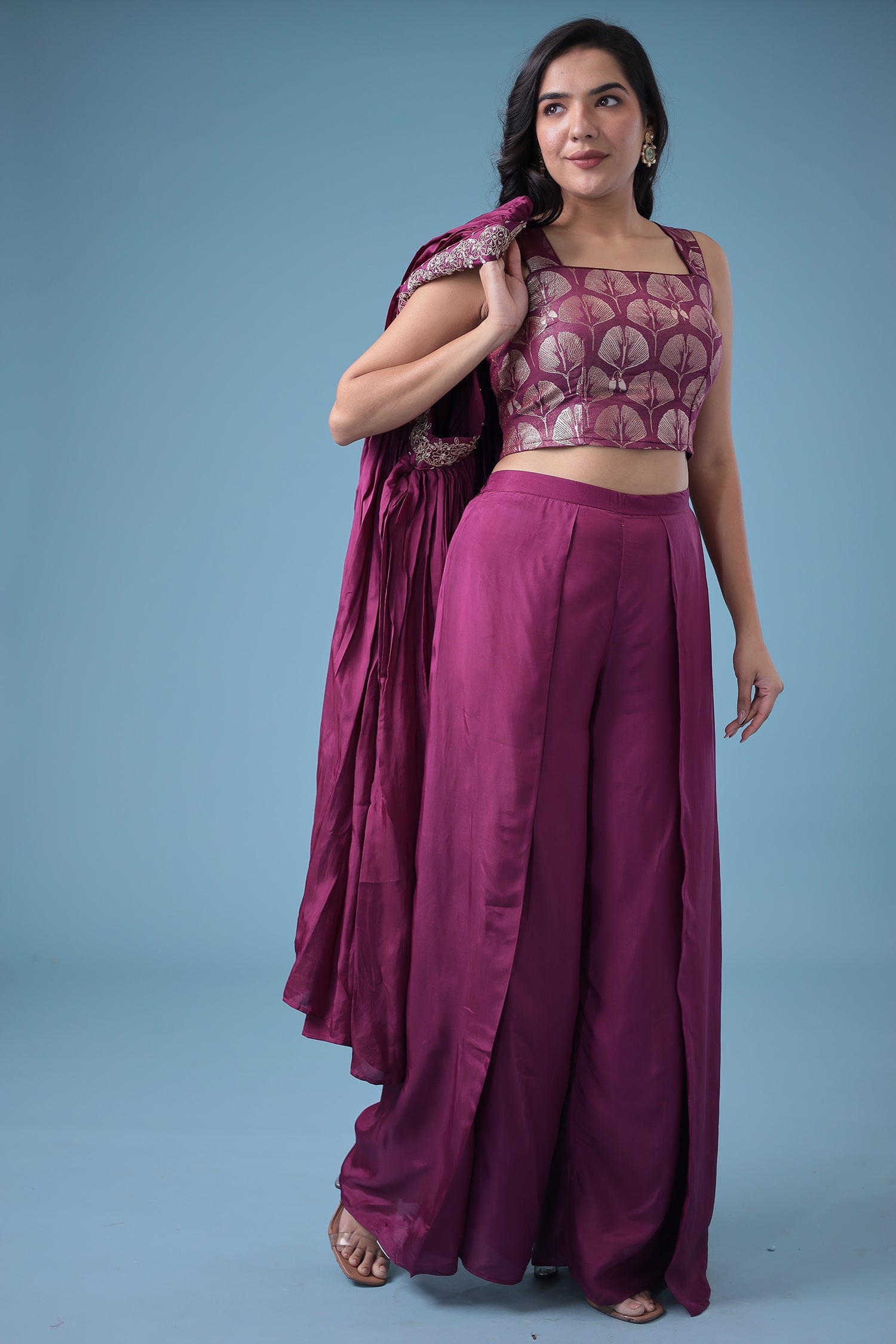 Exquisite Crop Top with Palazzo and a Draping Skirt Embellished with Zari and Dori work