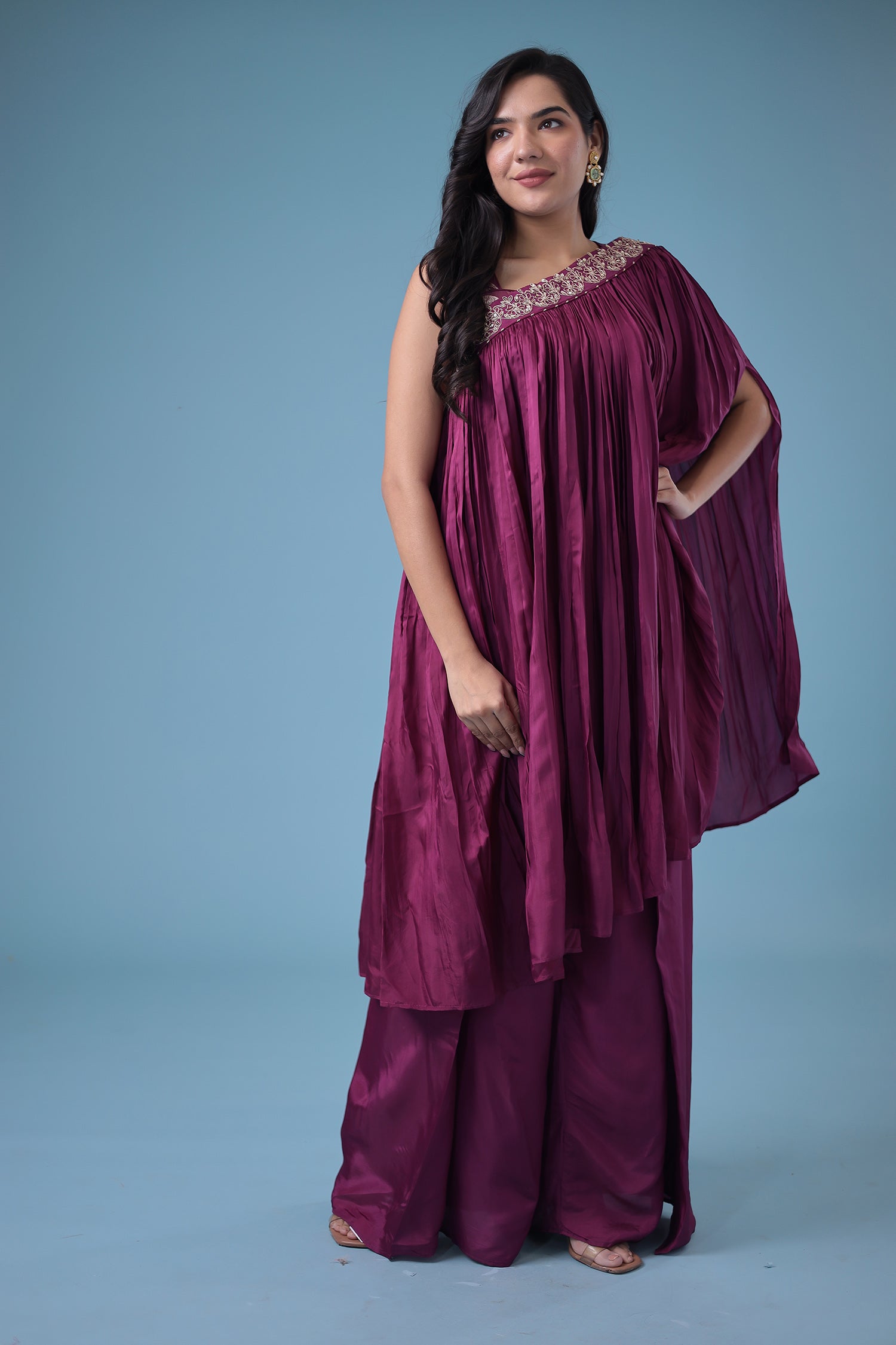 Exquisite Crop Top with Palazzo and a Draping Skirt Embellished with Zari and Dori work