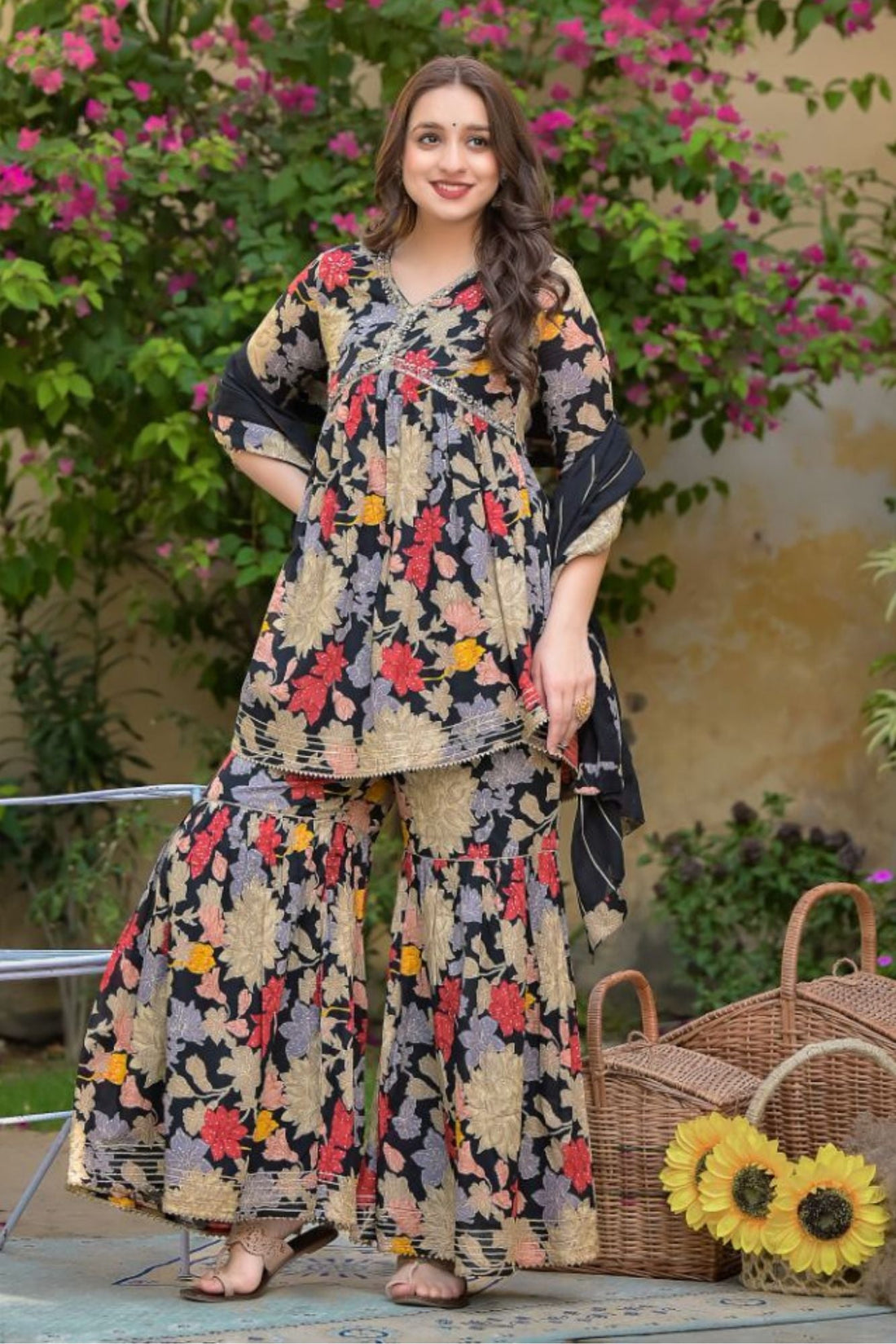 Printed Peplum Style Muslin Kurta Set with Sequins work.
