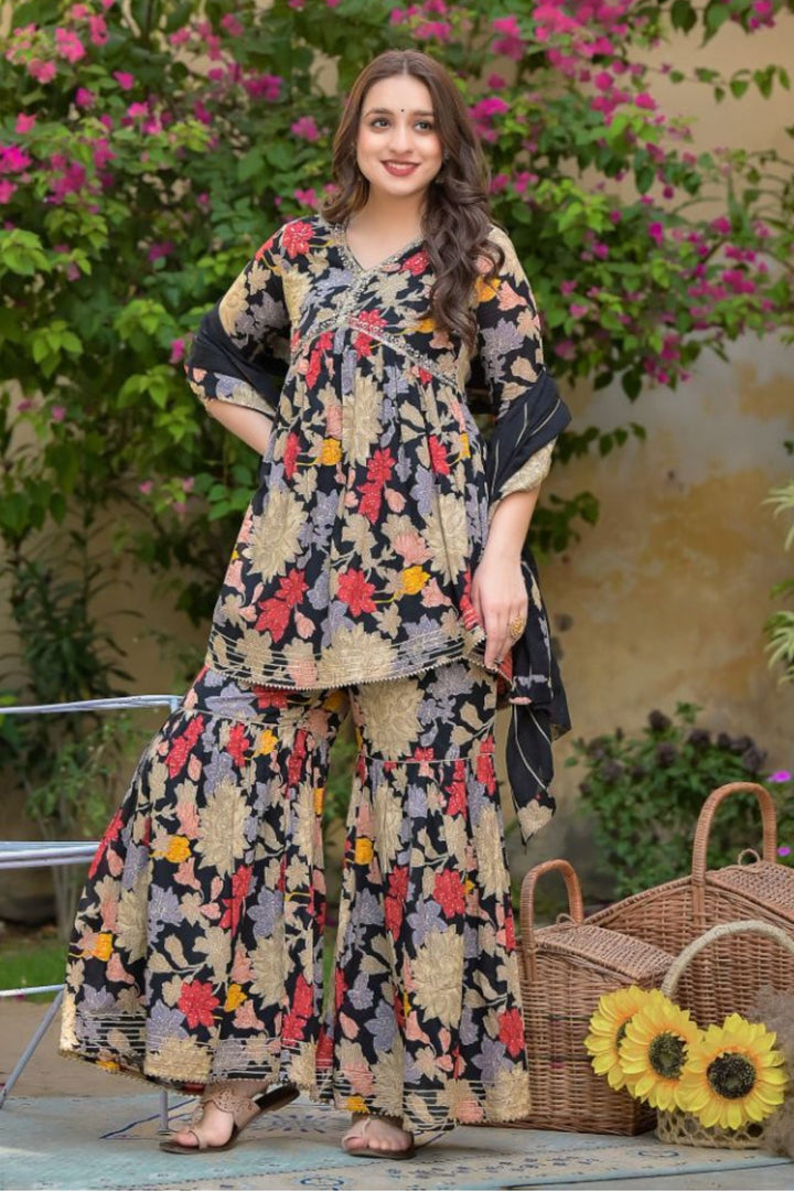 Printed Peplum Style Muslin Kurta Set with Sequins work.