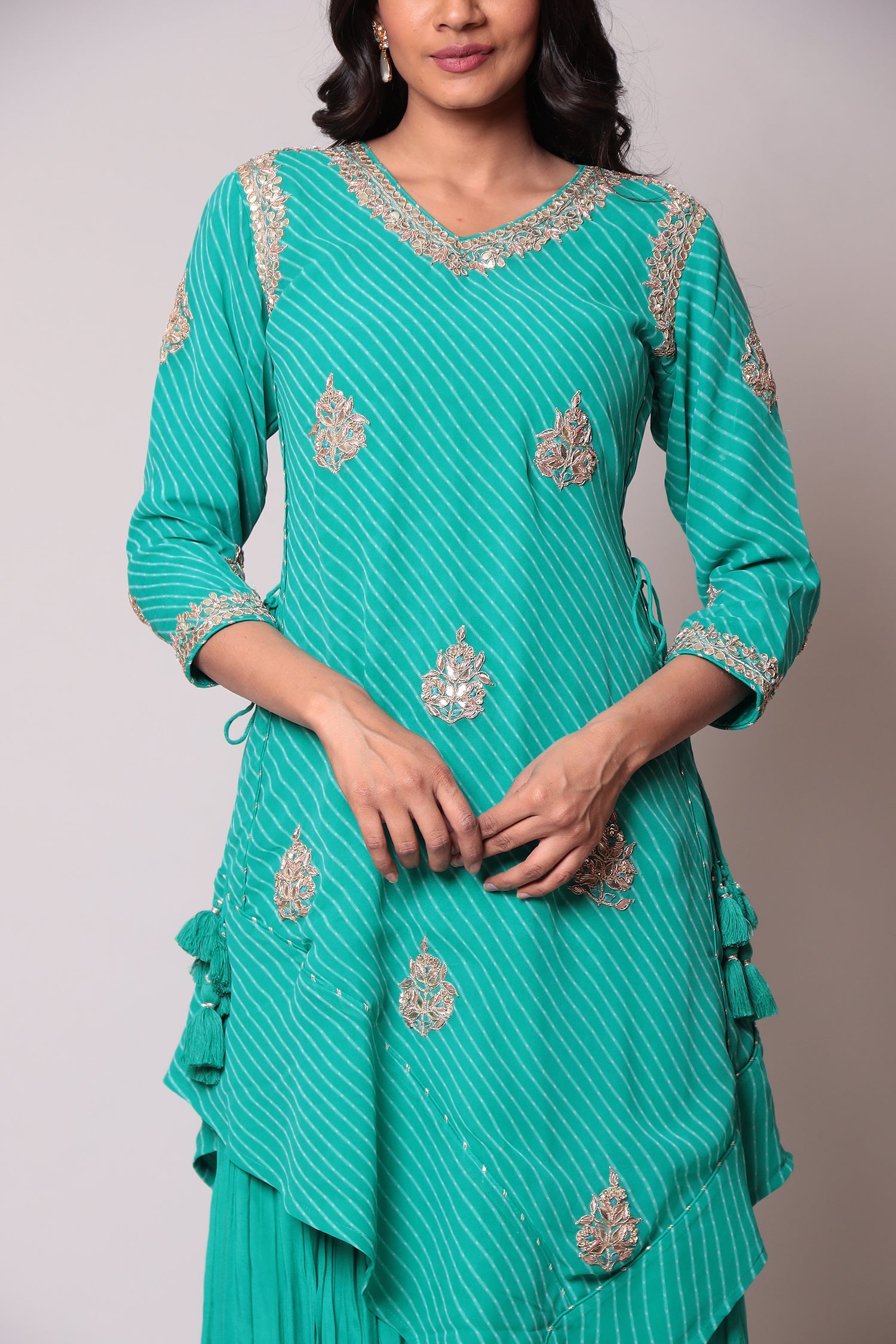 Leheriya Georgette Suit with Gota Patti work.