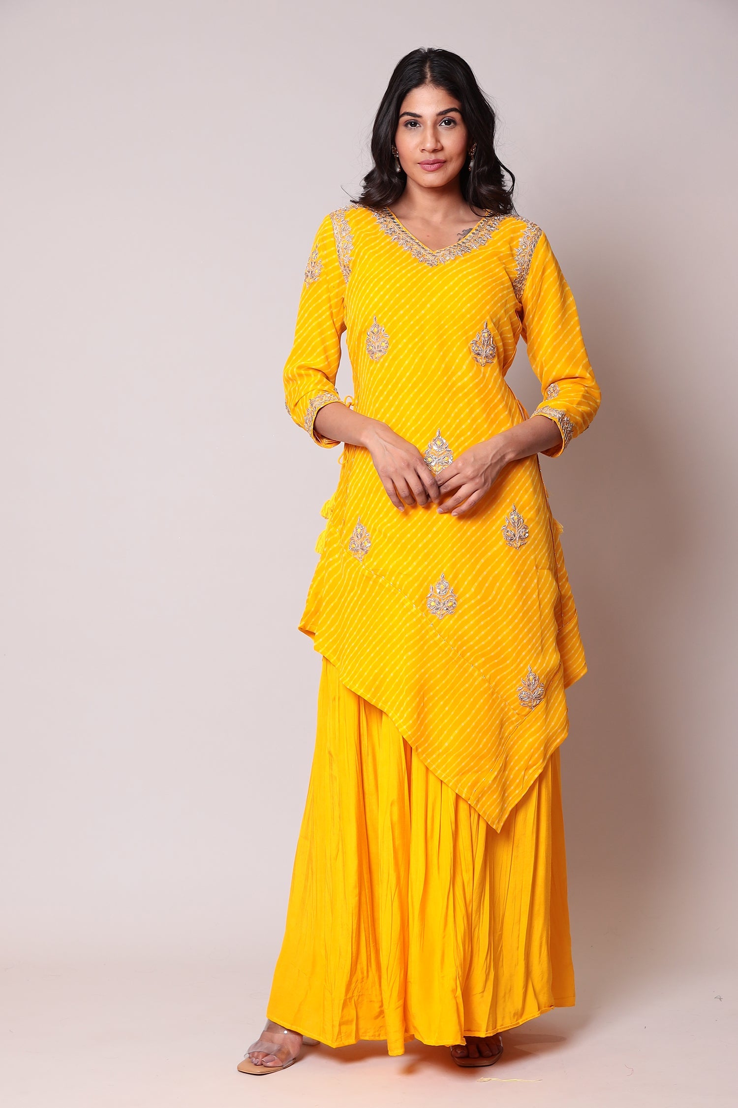 Leheriya Georgette Suit with Gota Patti work.
