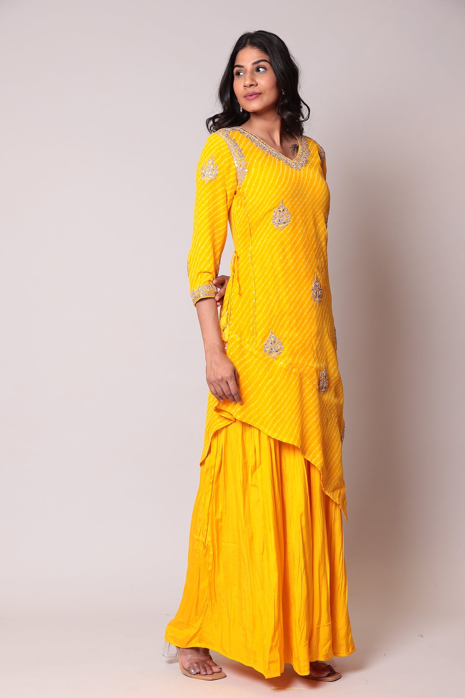 Leheriya Georgette Suit with Gota Patti work.