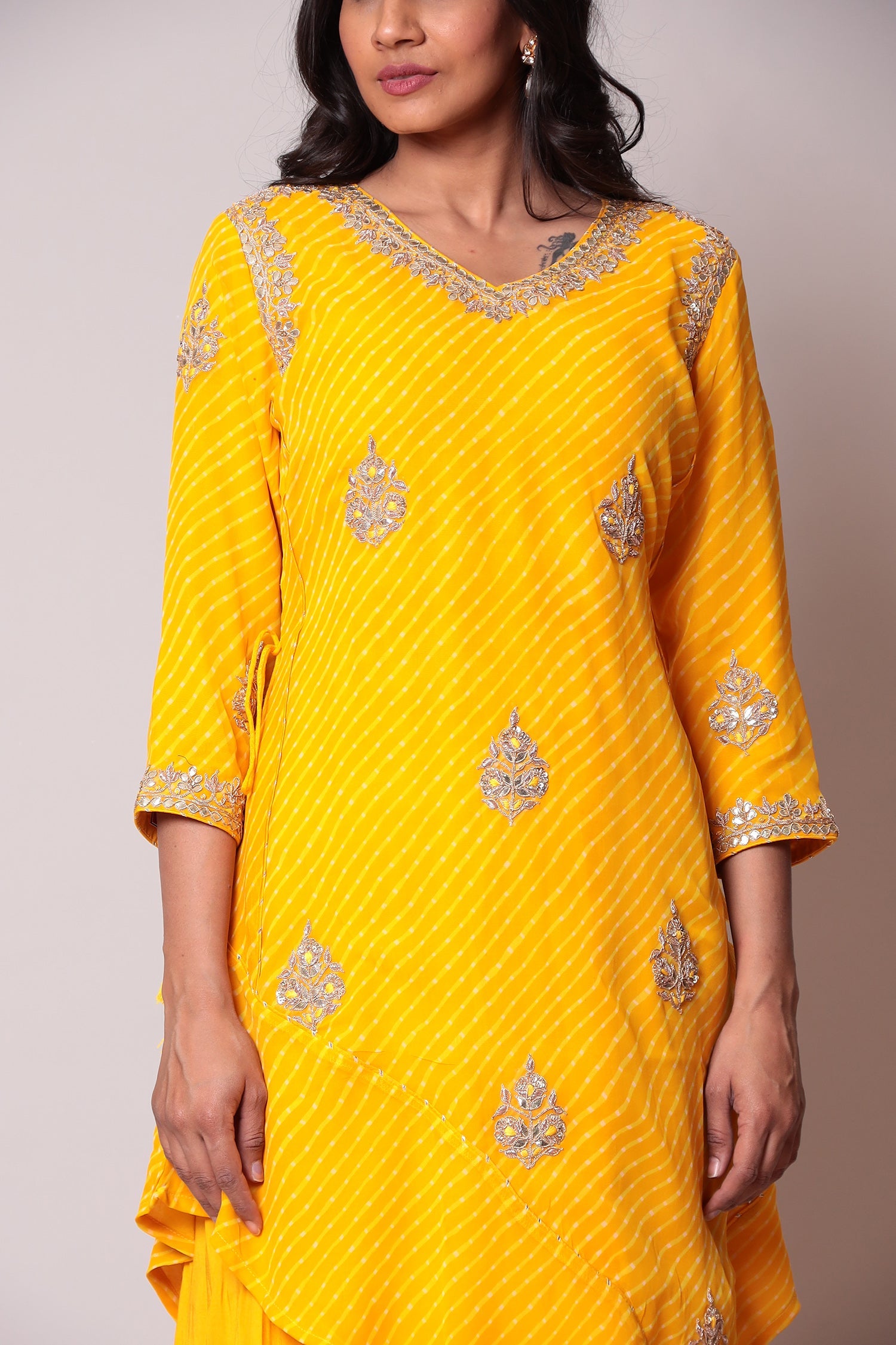 Leheriya Georgette Suit with Gota Patti work.