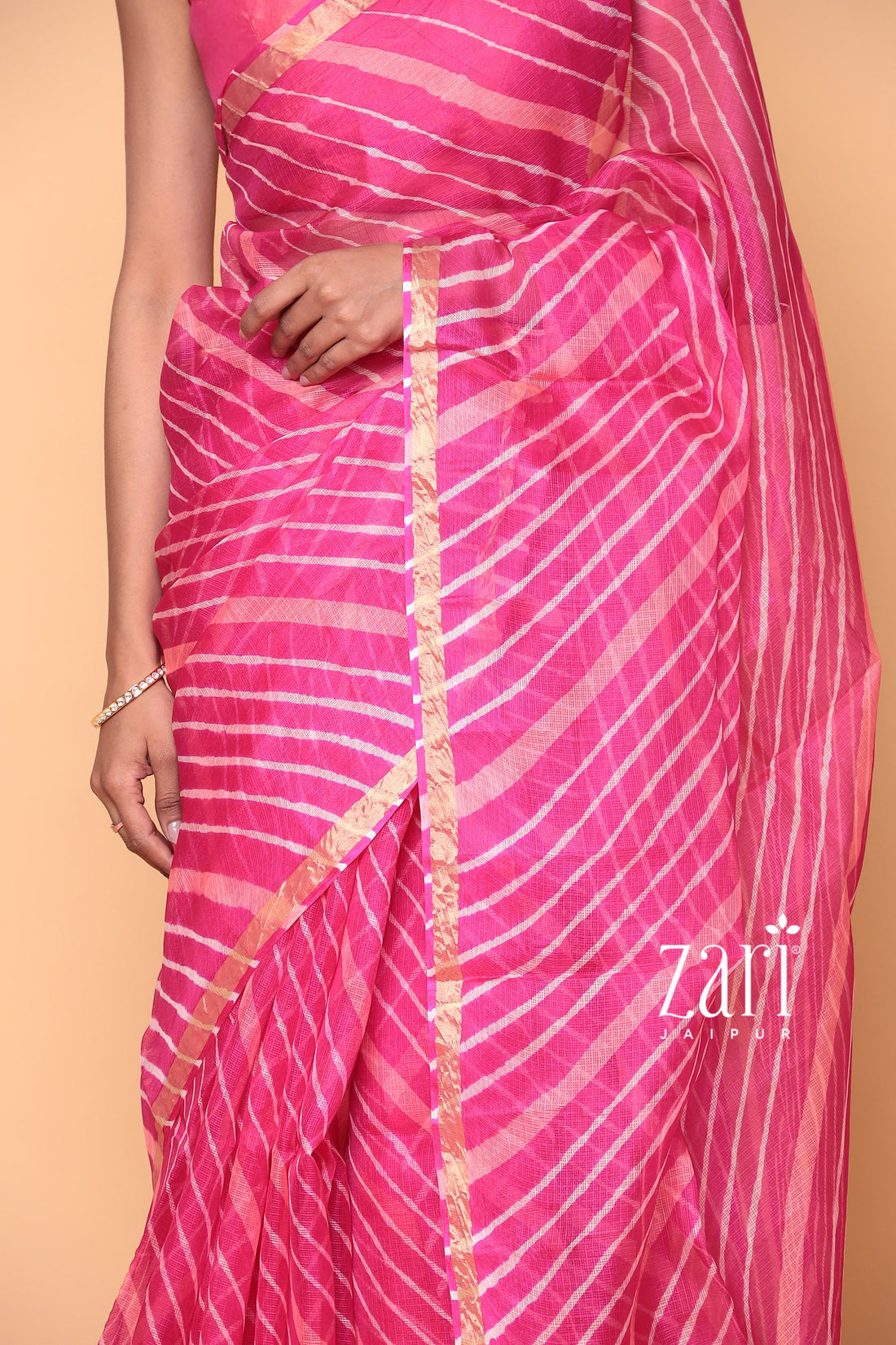 Kota Doria Silk Leheriya Saree with Zari work.