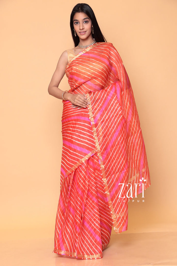 Kota Doria Silk Leheriya Saree with Zari work.