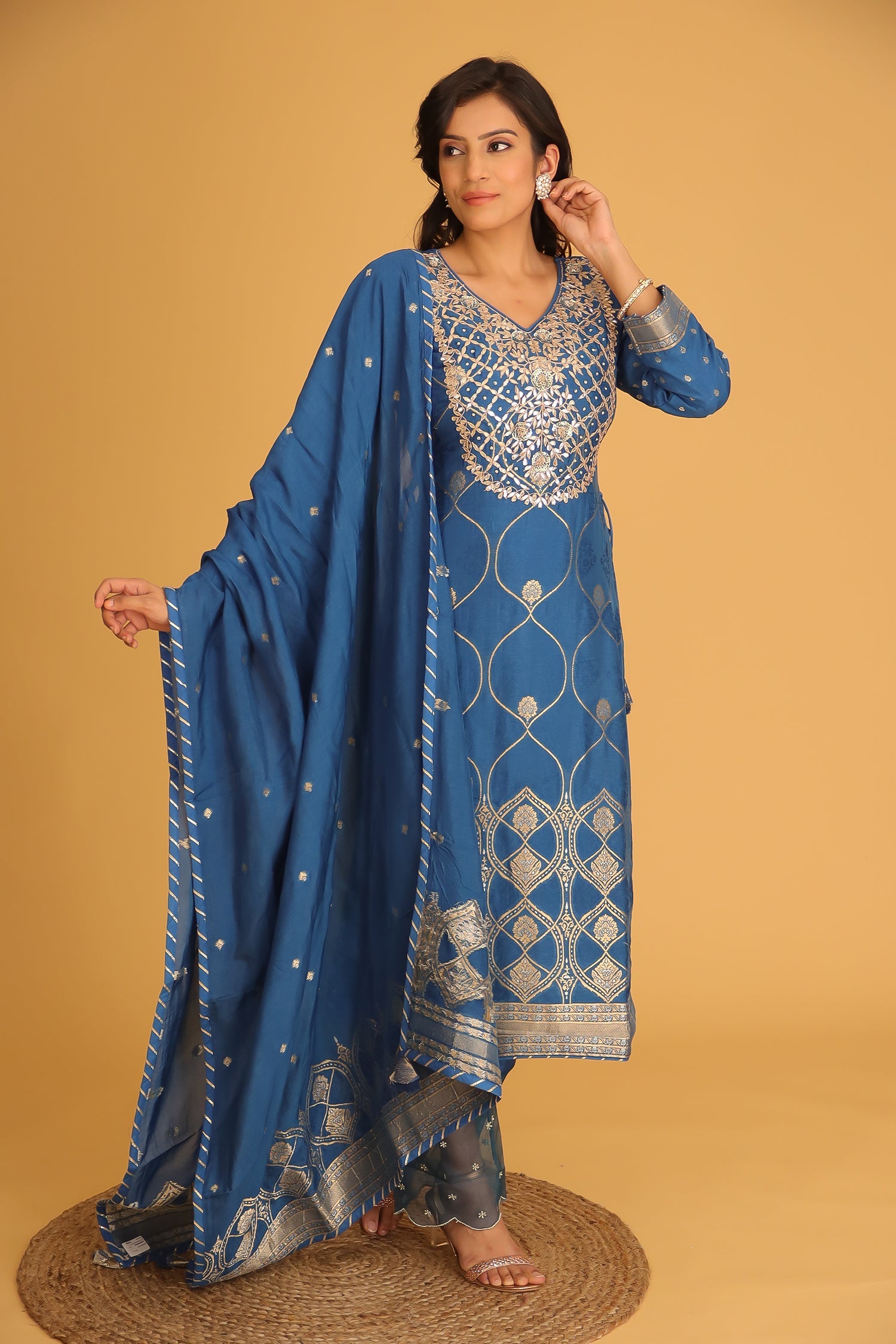 Handloom Chanderi Suit Embroidered with Gota Patti work.