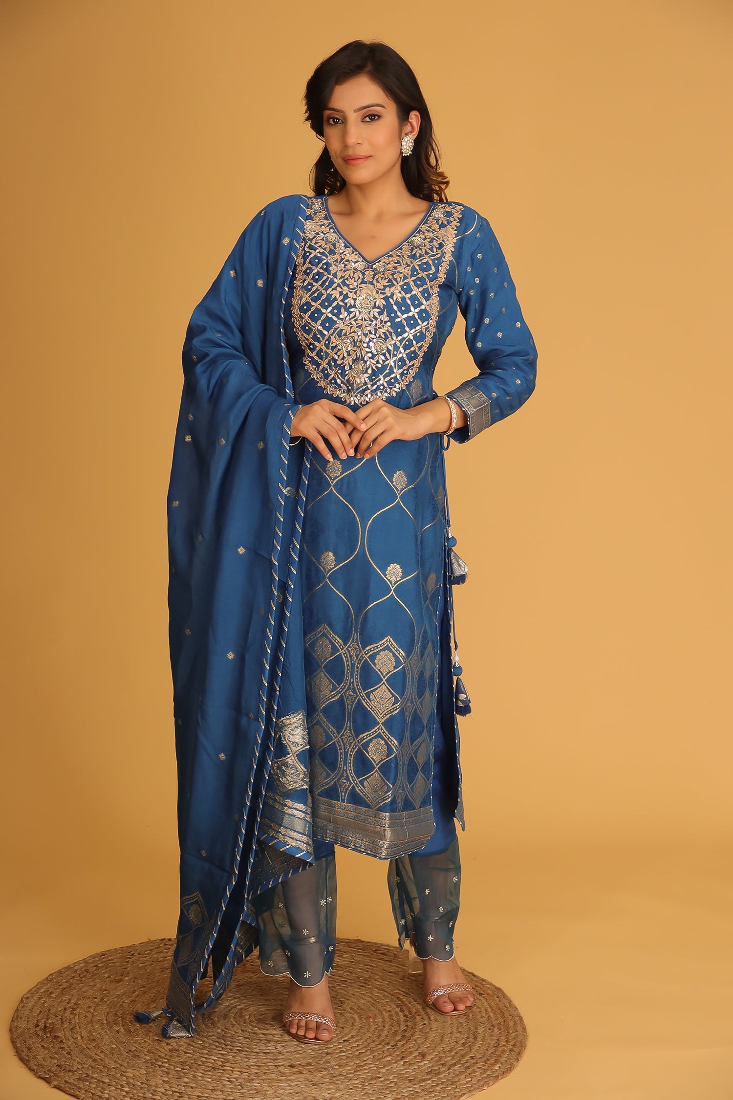 Handloom Chanderi Suit Embroidered with Gota Patti work.