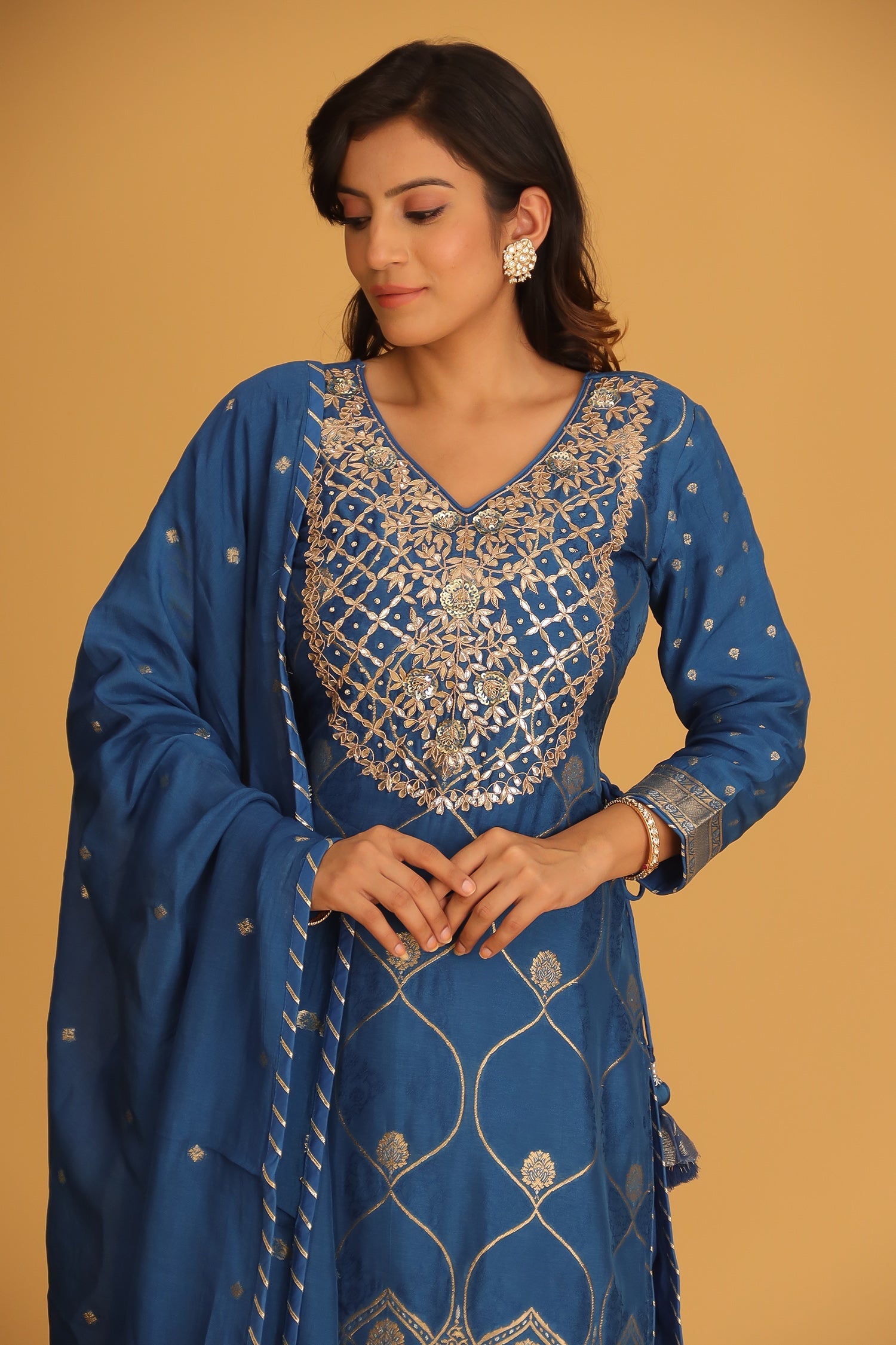 Handloom Chanderi Suit Embroidered with Gota Patti work.