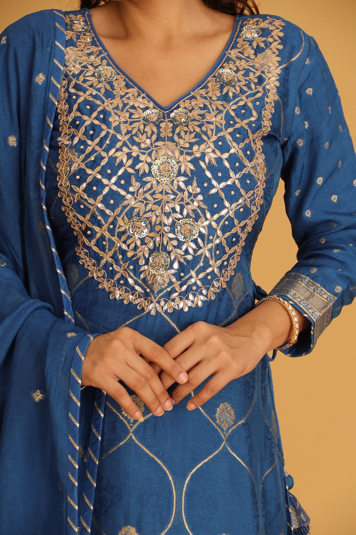 Handloom Chanderi Suit Embroidered with Gota Patti work.
