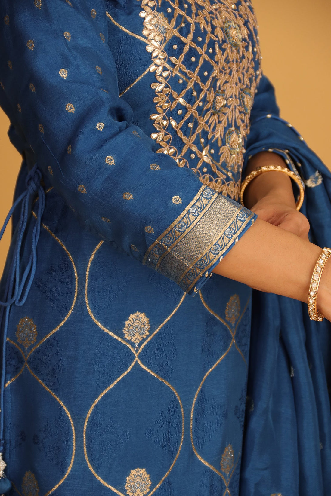 Handloom Chanderi Suit Embroidered with Gota Patti work.