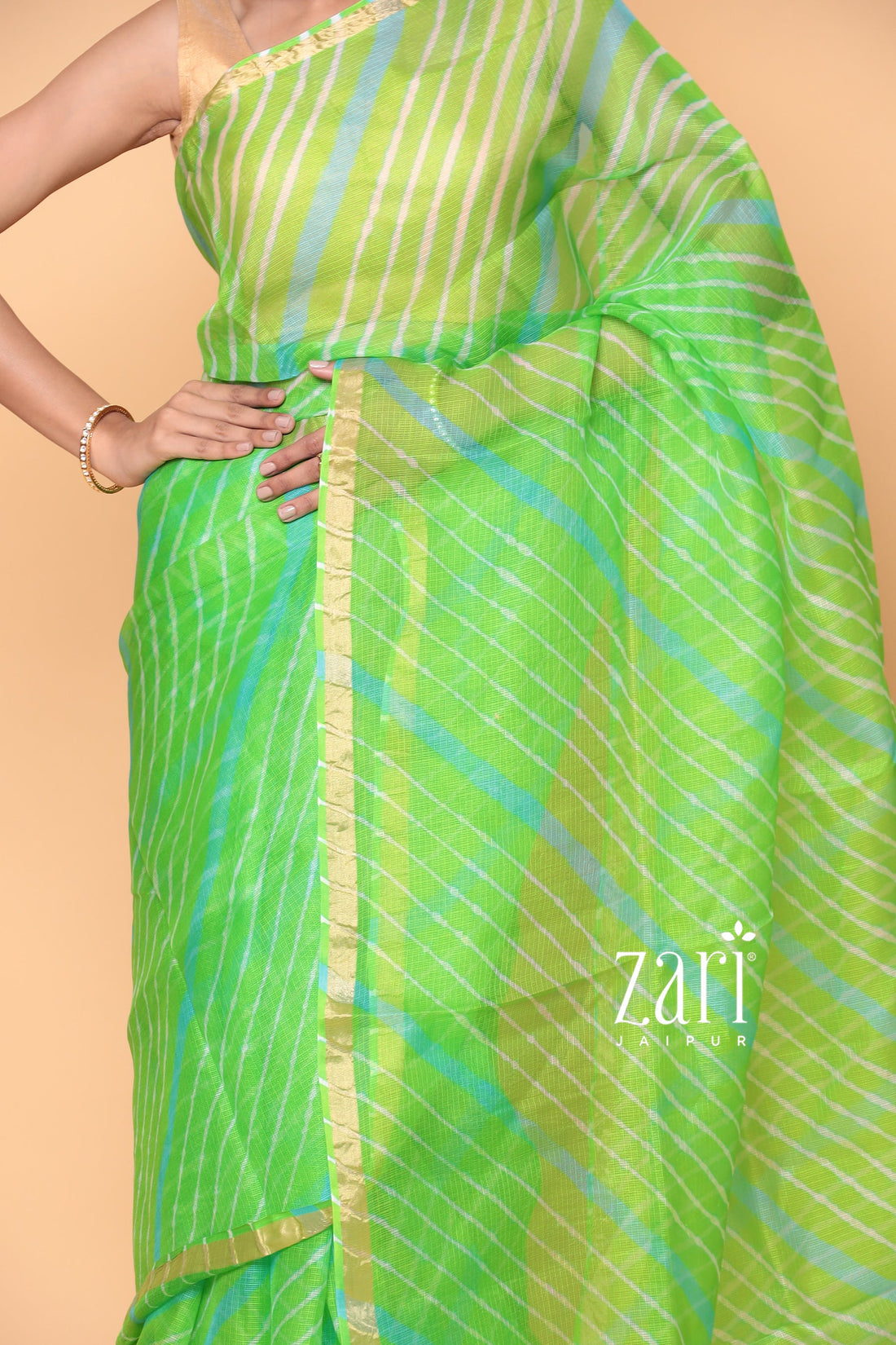 Kota Doria Silk Leheriya Saree with Zari work.