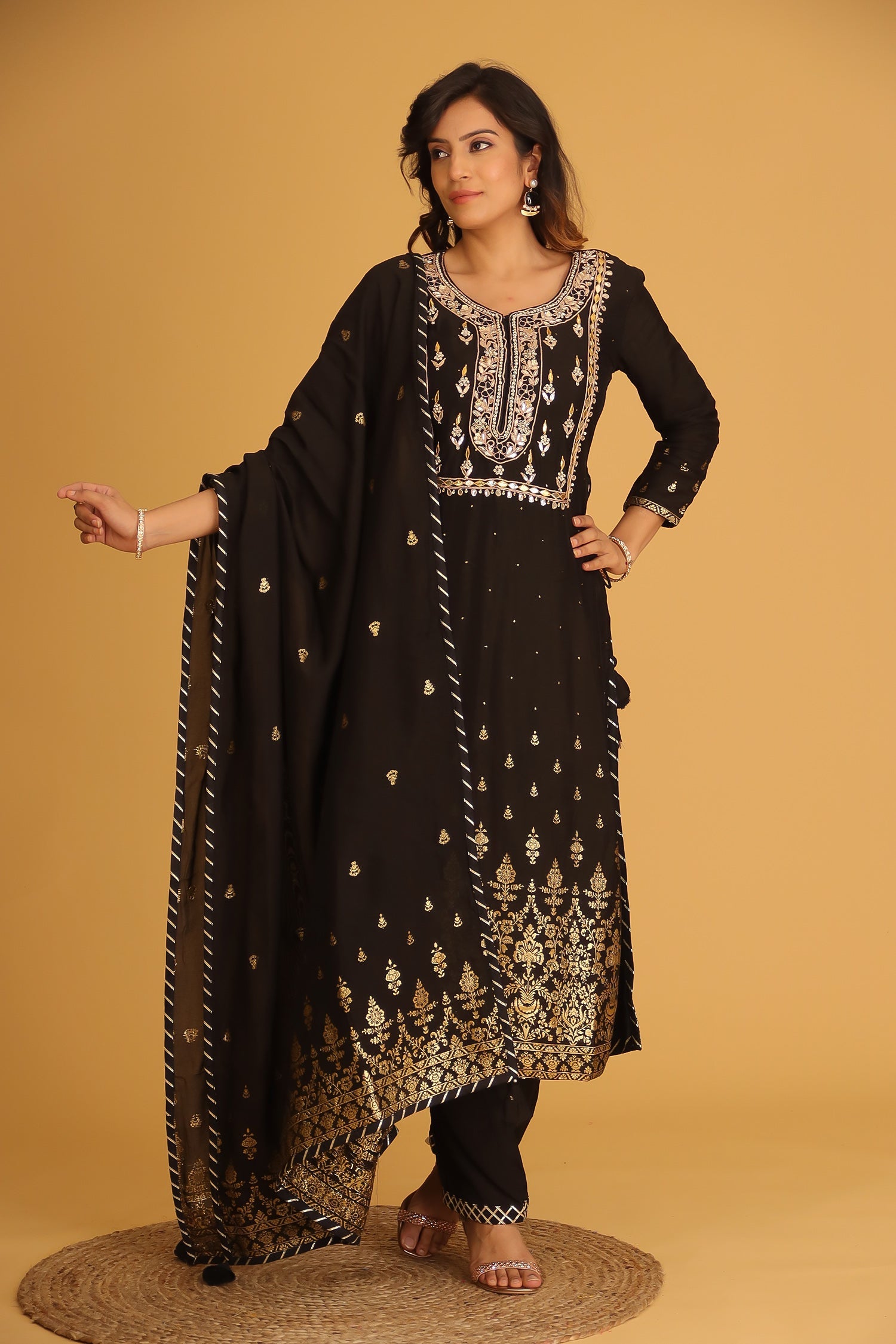 Handloom Chanderi Suit Embroidered with Gota Patti work.
