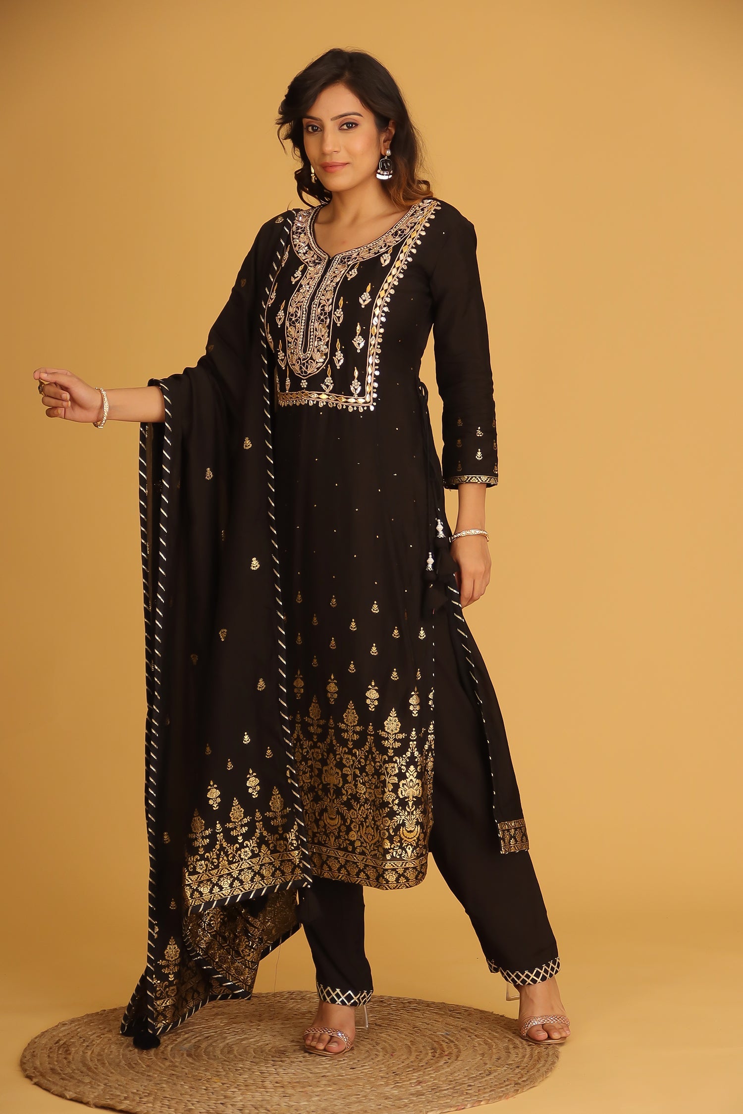 Handloom Chanderi Suit Embroidered with Gota Patti work.