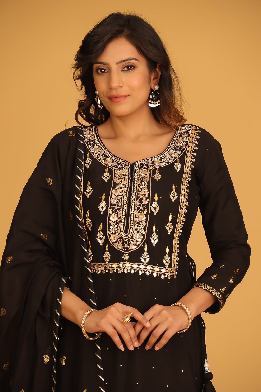 Handloom Chanderi Suit Embroidered with Gota Patti work.