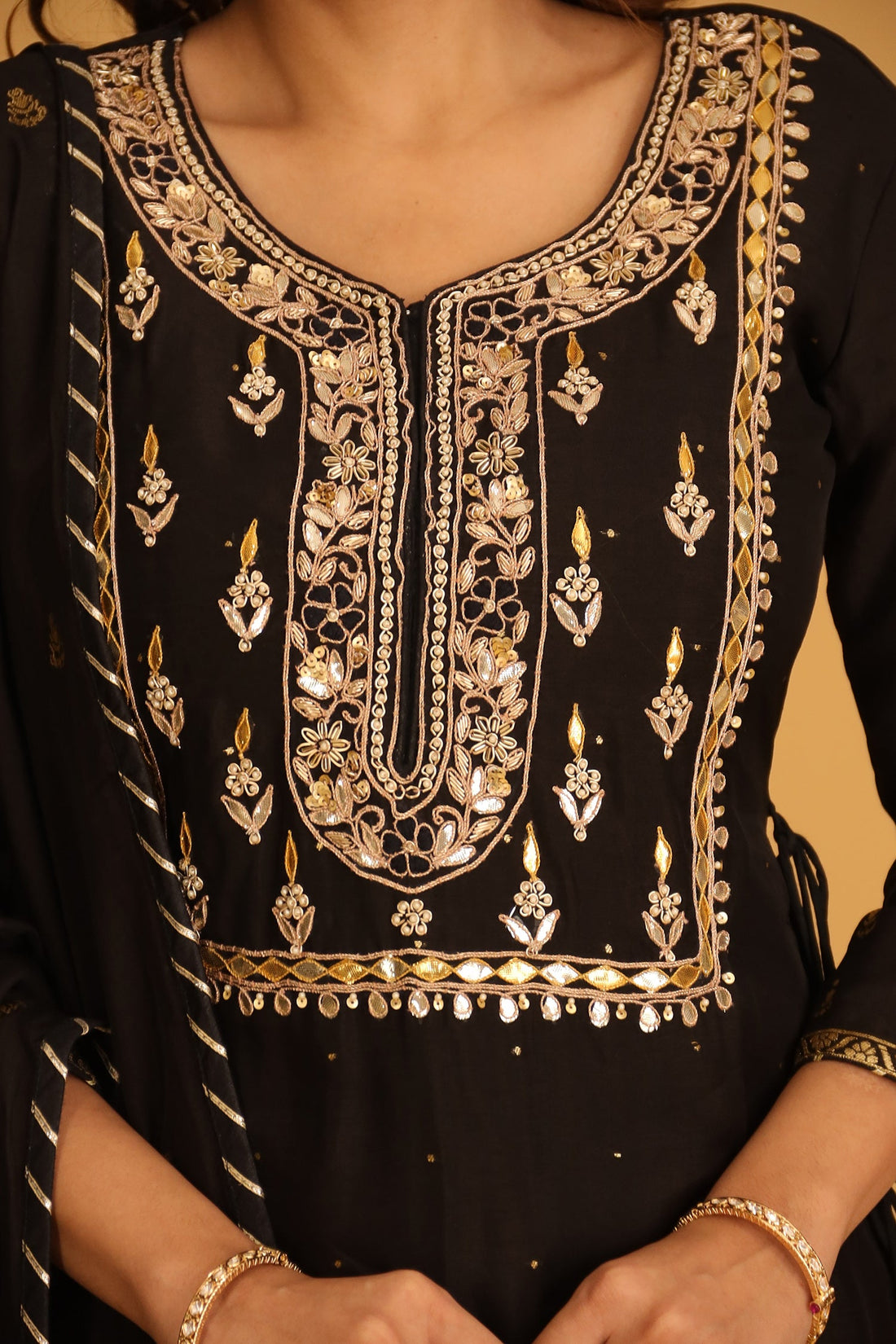 Handloom Chanderi Suit Embroidered with Gota Patti work.
