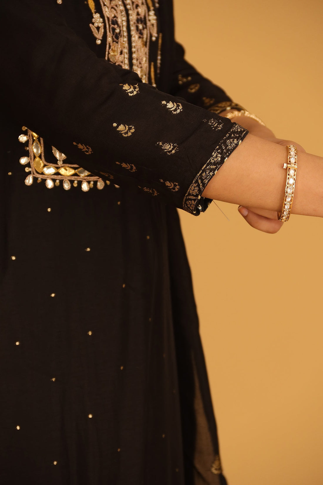 Handloom Chanderi Suit Embroidered with Gota Patti work.