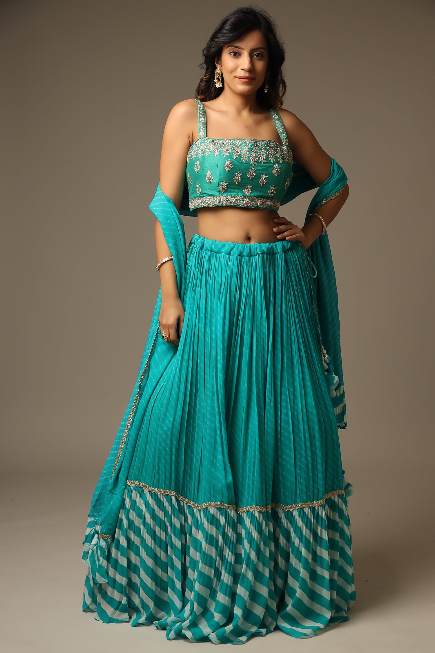 Leheriya Georgette Lehenga with Gota Patti and Mothra work.