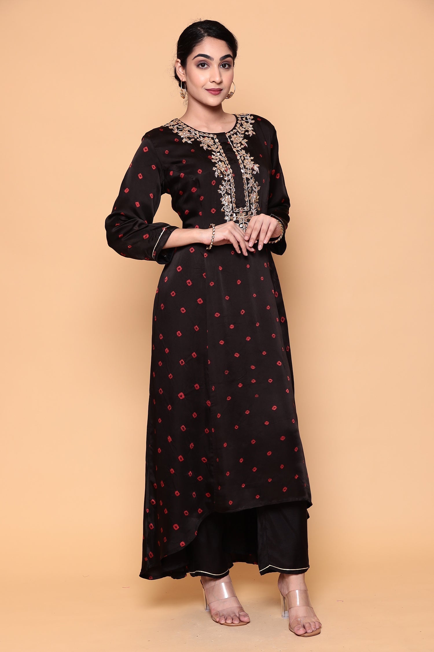 Asymmetric Bandhej Silk Suit with Gota work.