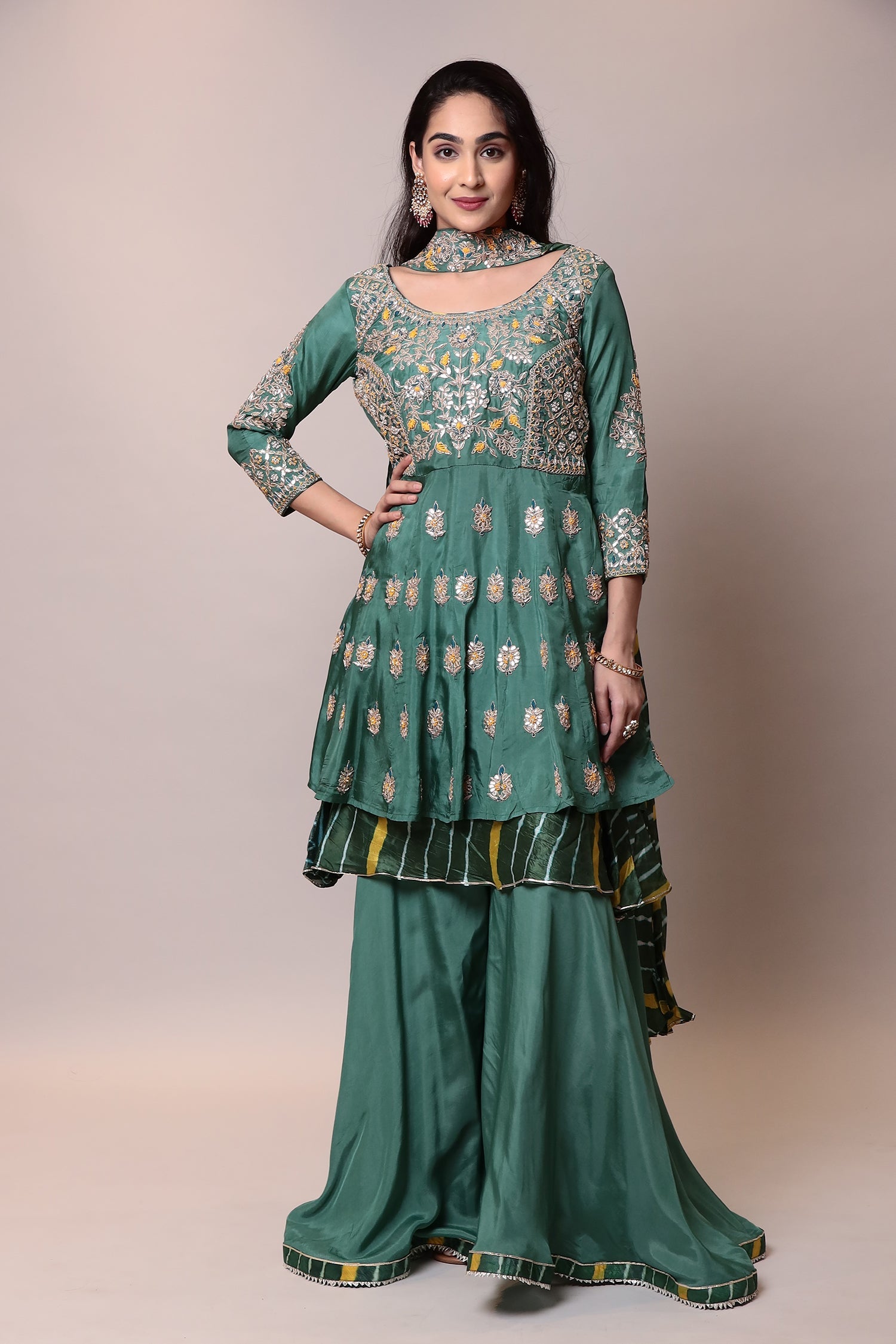 Silk Suitwith Gota Patti, Pearl, Thread work.