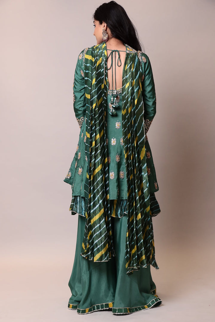 Silk Suitwith Gota Patti, Pearl, Thread work.