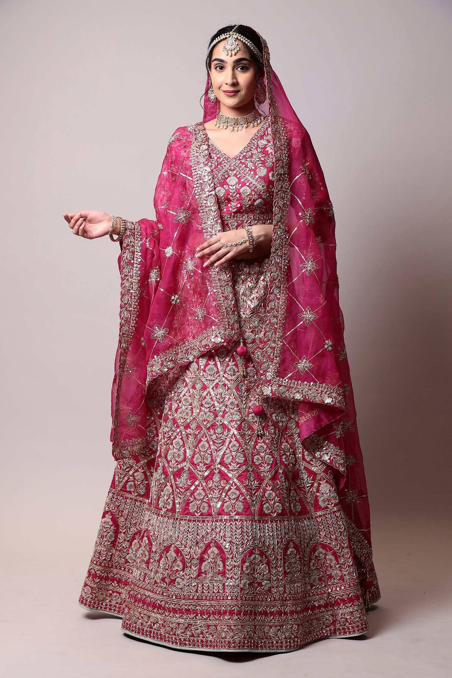Raw silk Lehenga with Gota Patti, Thread, Zardozi work.