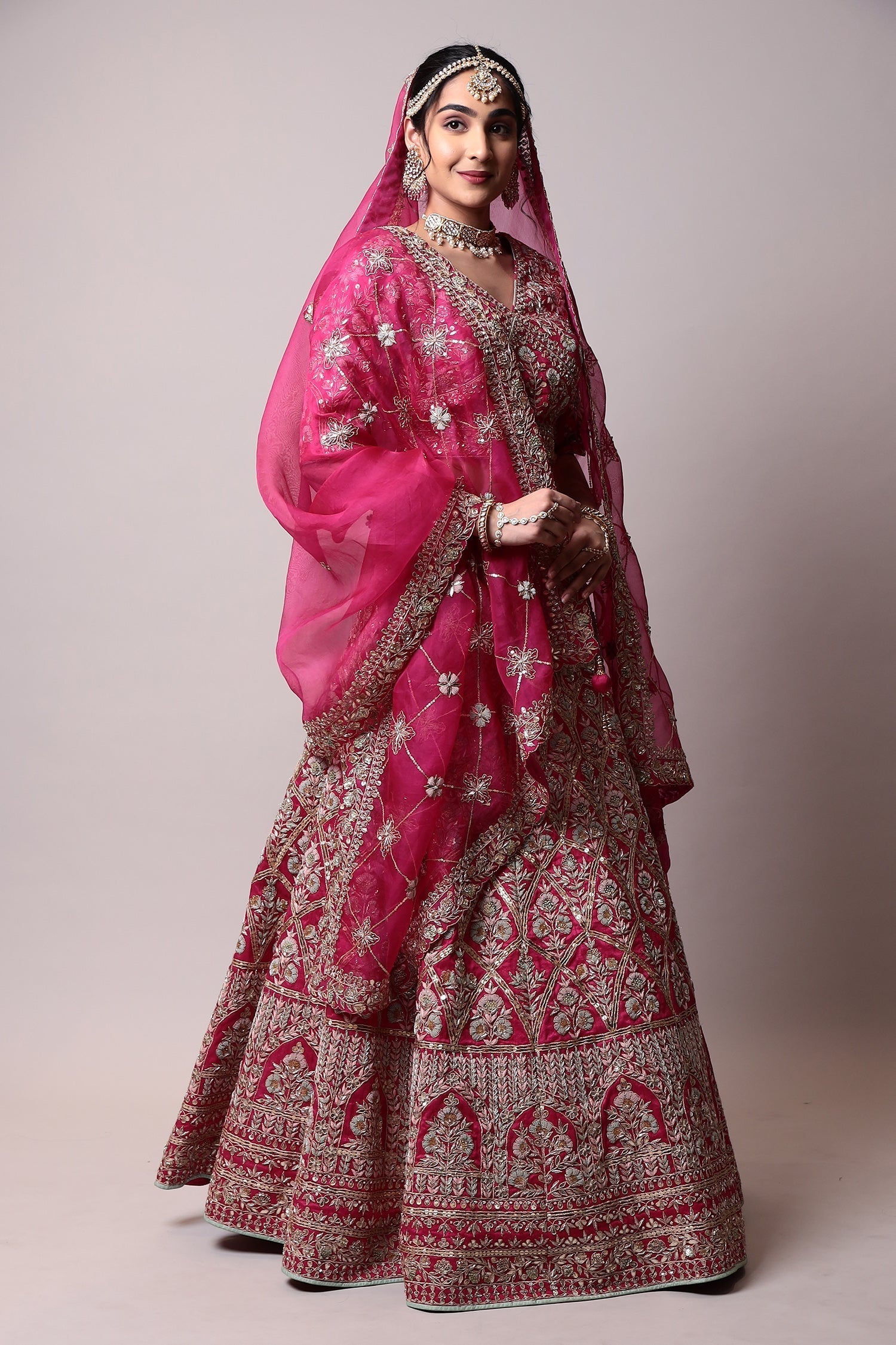 Raw silk Lehenga with Gota Patti, Thread, Zardozi work.