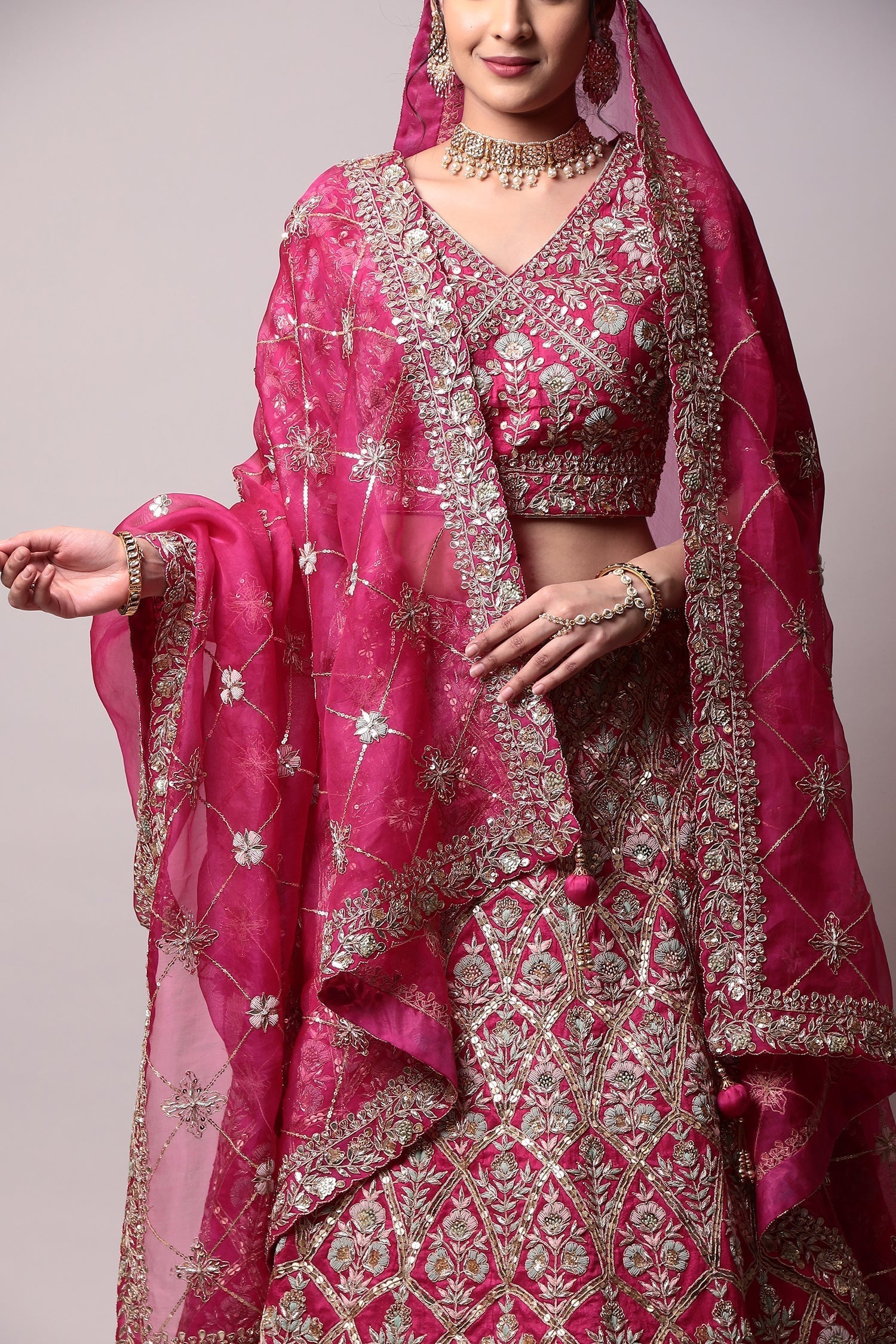 Raw silk Lehenga with Gota Patti, Thread, Zardozi work.