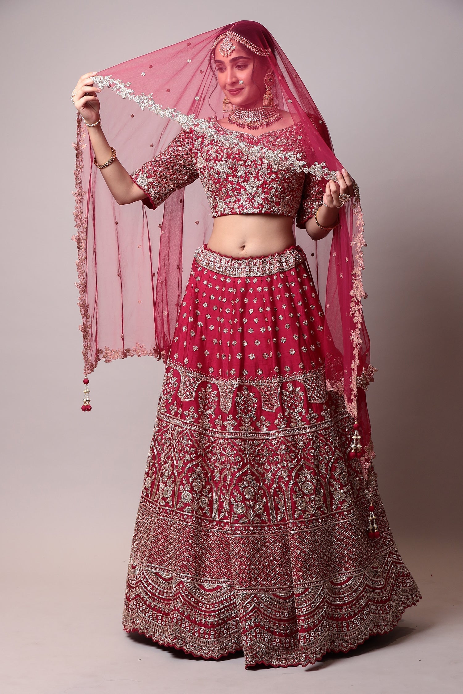 Raw silk lehenga with Pearl, Zardozi work.