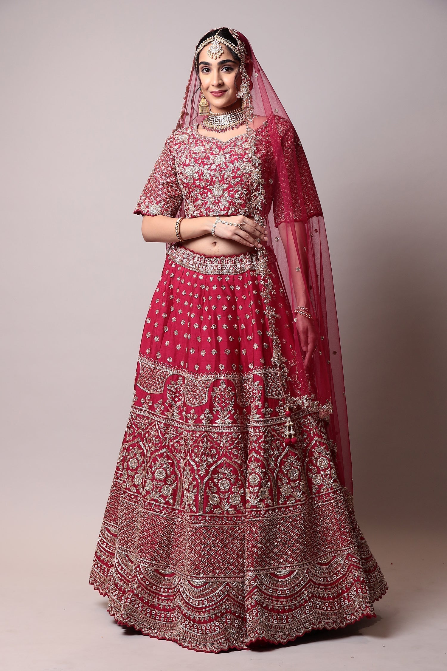 Raw silk lehenga with Pearl, Zardozi work.