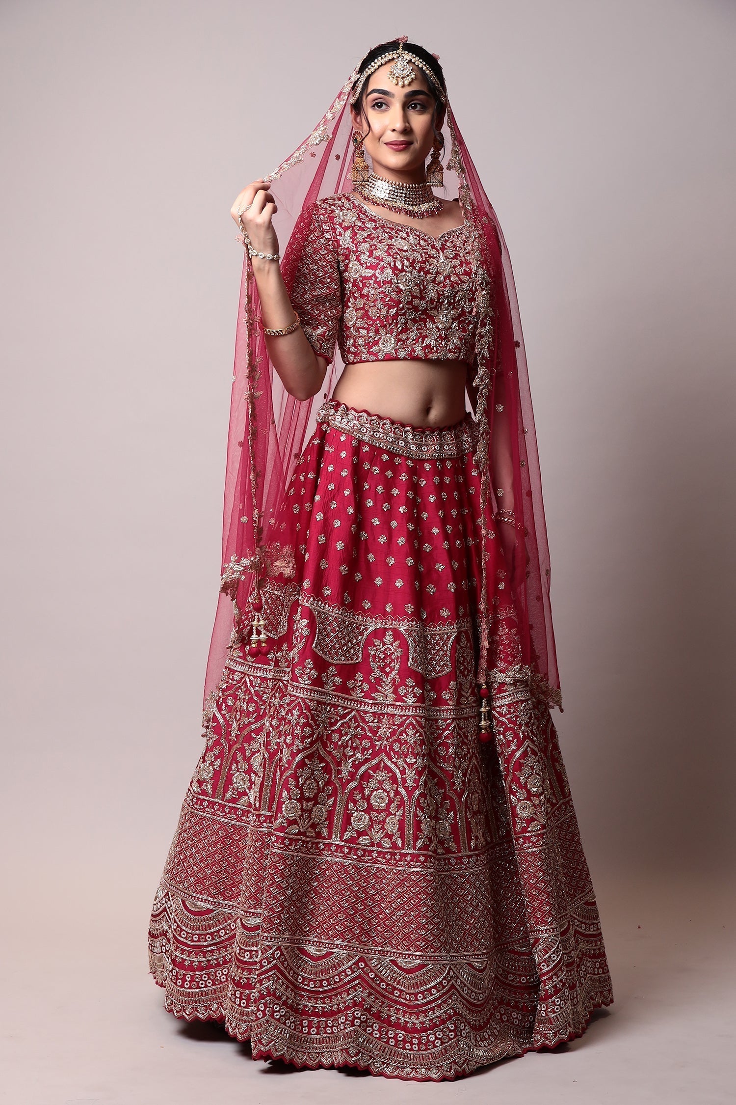 Raw silk lehenga with Pearl, Zardozi work.
