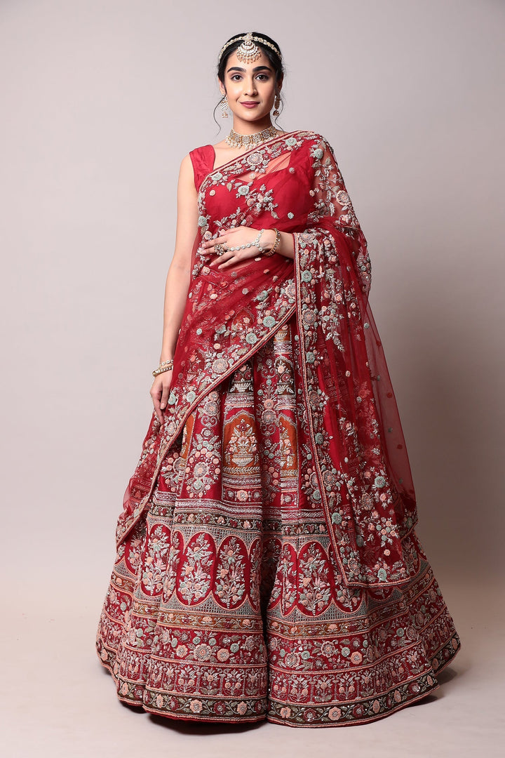 Raw silk Lehenga with Thread and Zardozi work.
