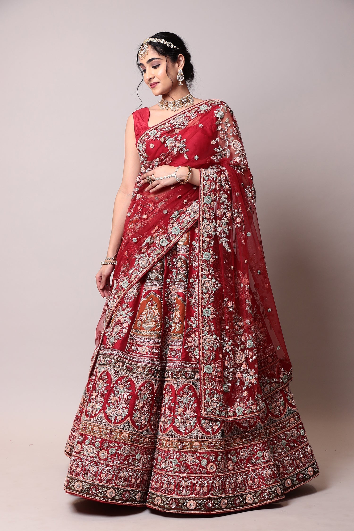 Raw silk Lehenga with Thread and Zardozi work.