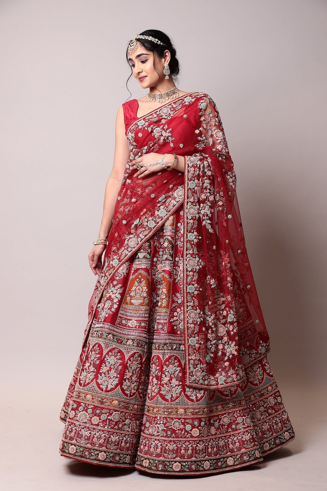 Raw silk Lehenga with Thread and Zardozi work.