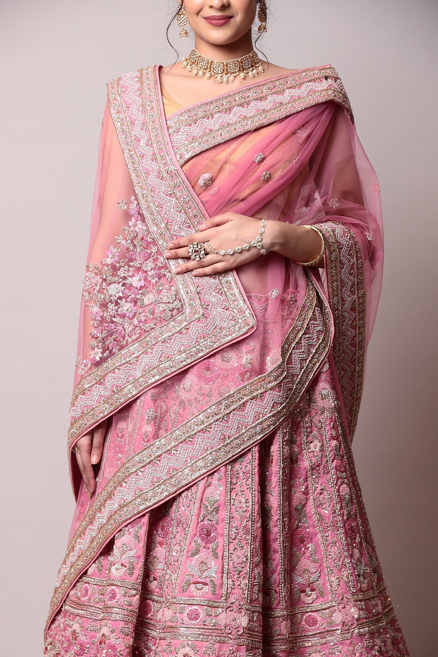 Silk Lehenga with Pearl, Thread and Zardozi work.
