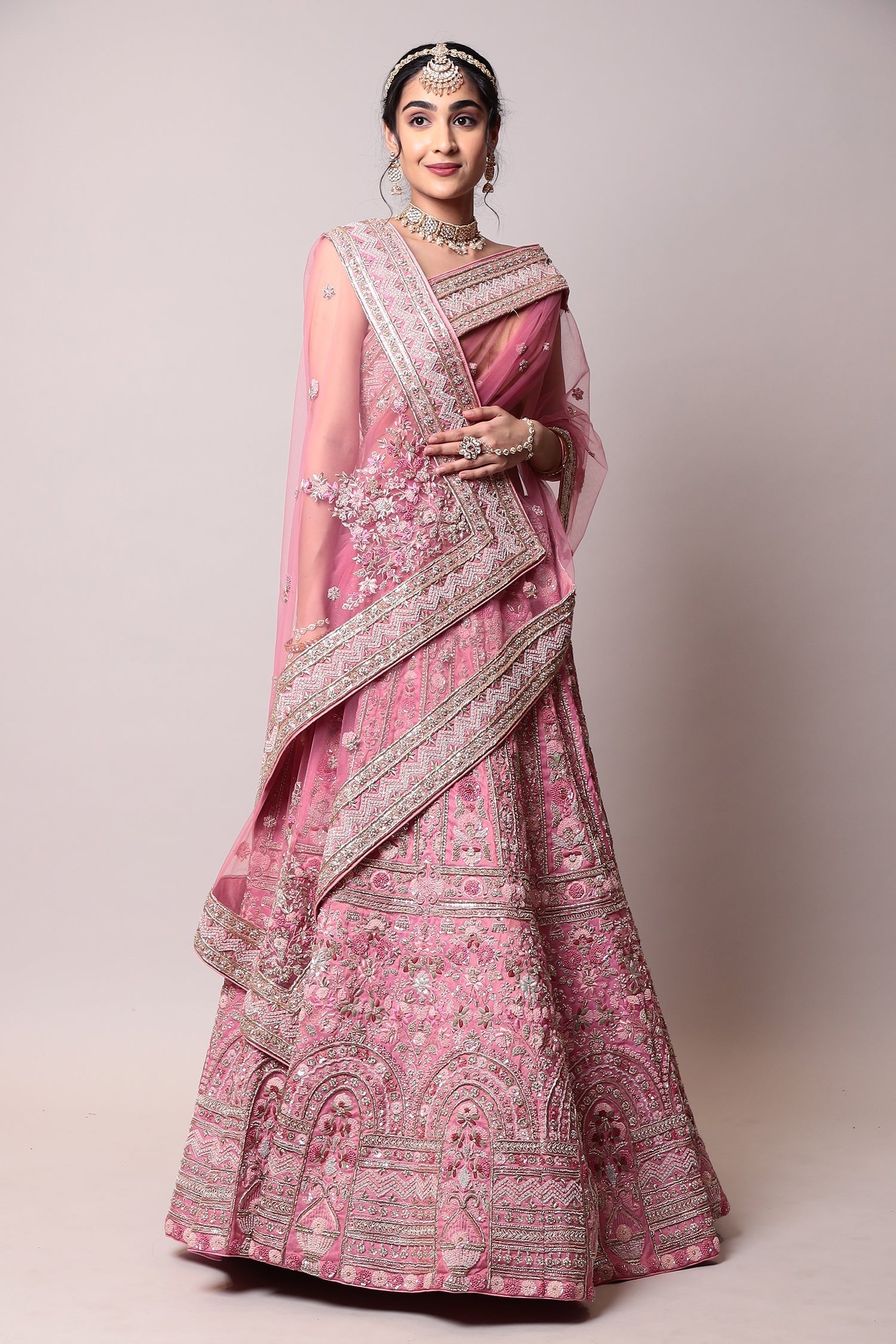 Silk Lehenga with Pearl, Thread and Zardozi work.