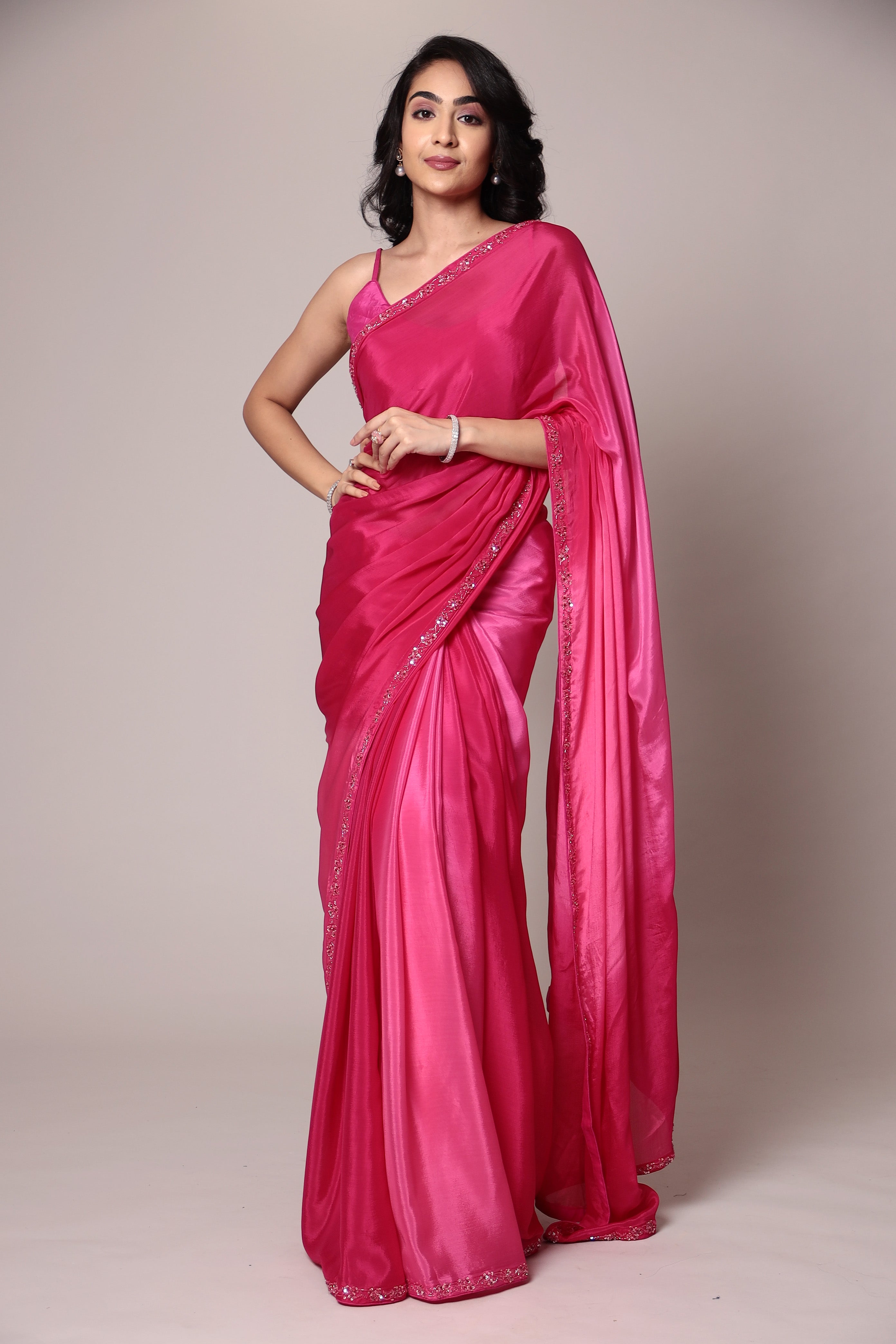 Exquisite Silk Saree adorned with intricate Cutdana embellishments.