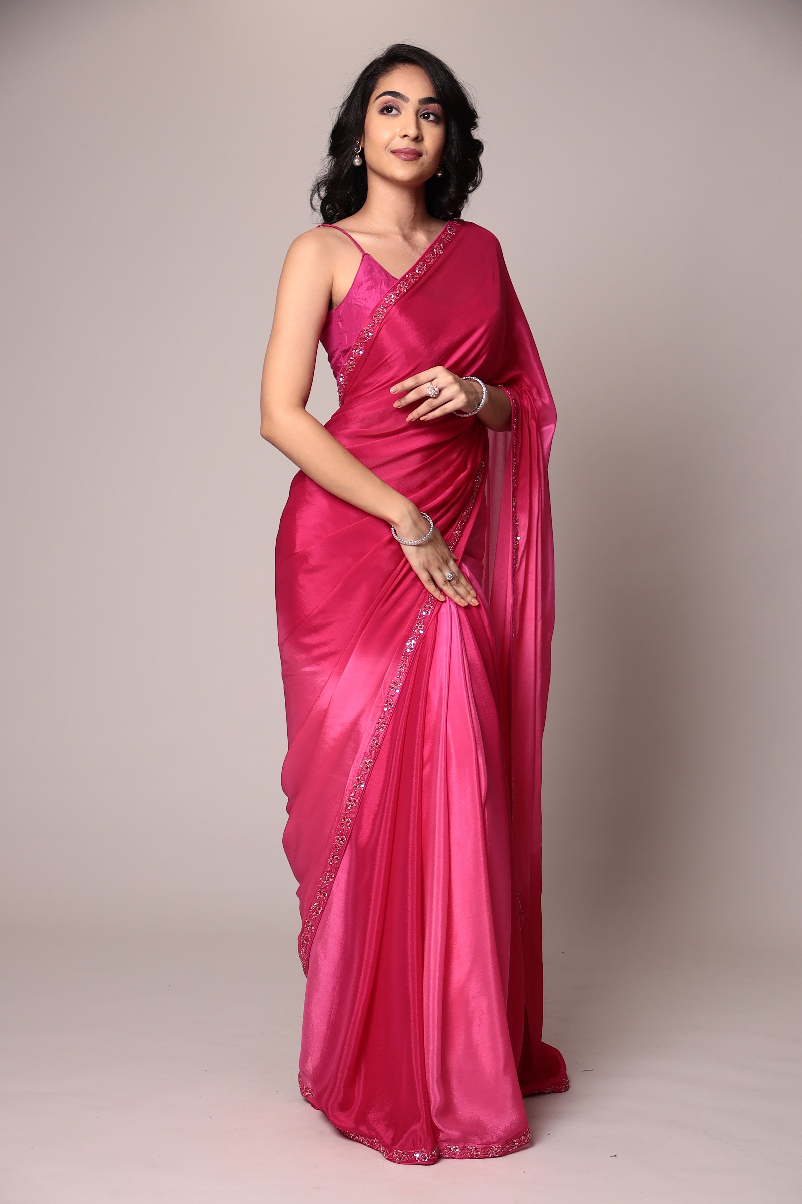Exquisite Silk Saree adorned with intricate Cutdana embellishments.