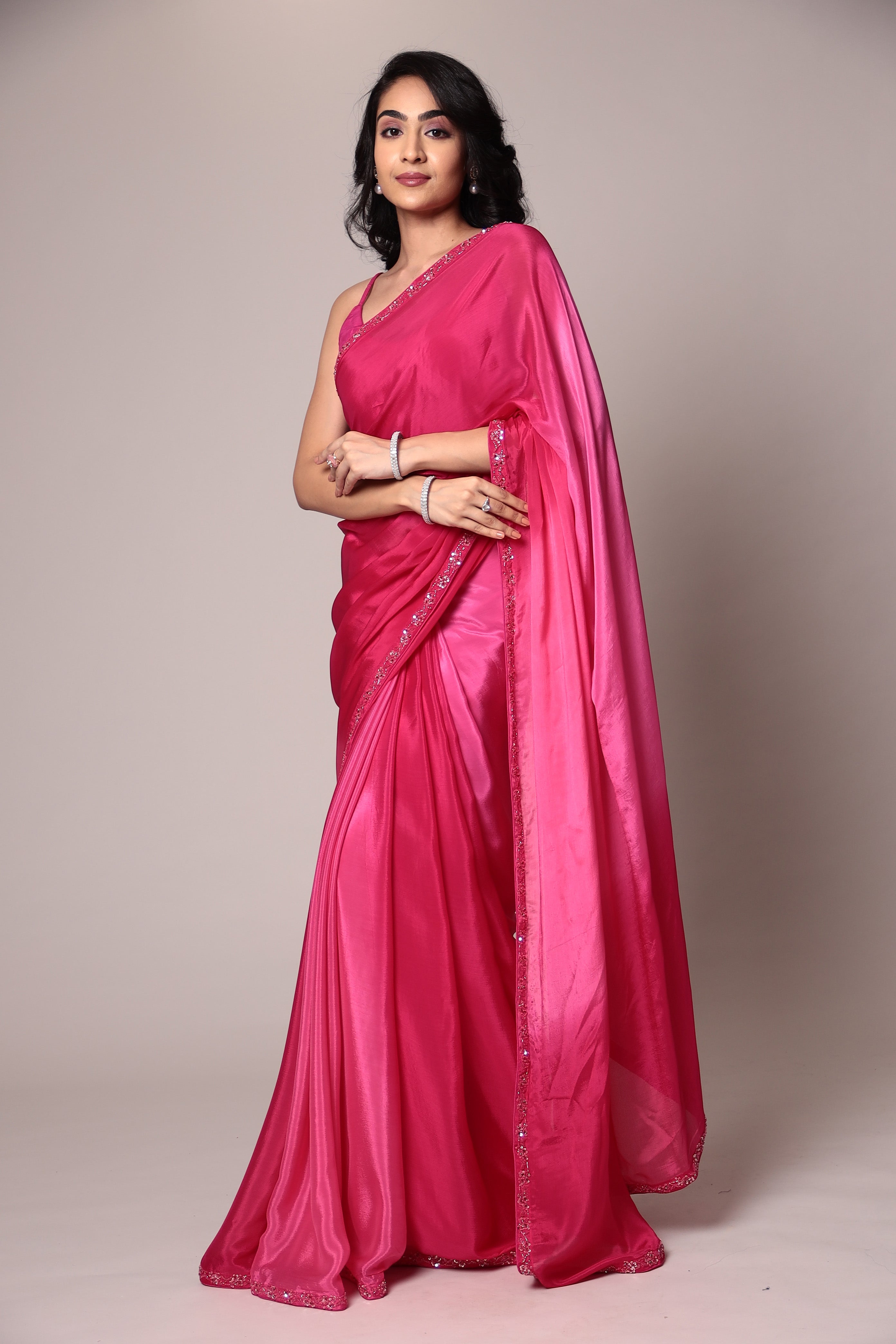 Exquisite Silk Saree adorned with intricate Cutdana embellishments.