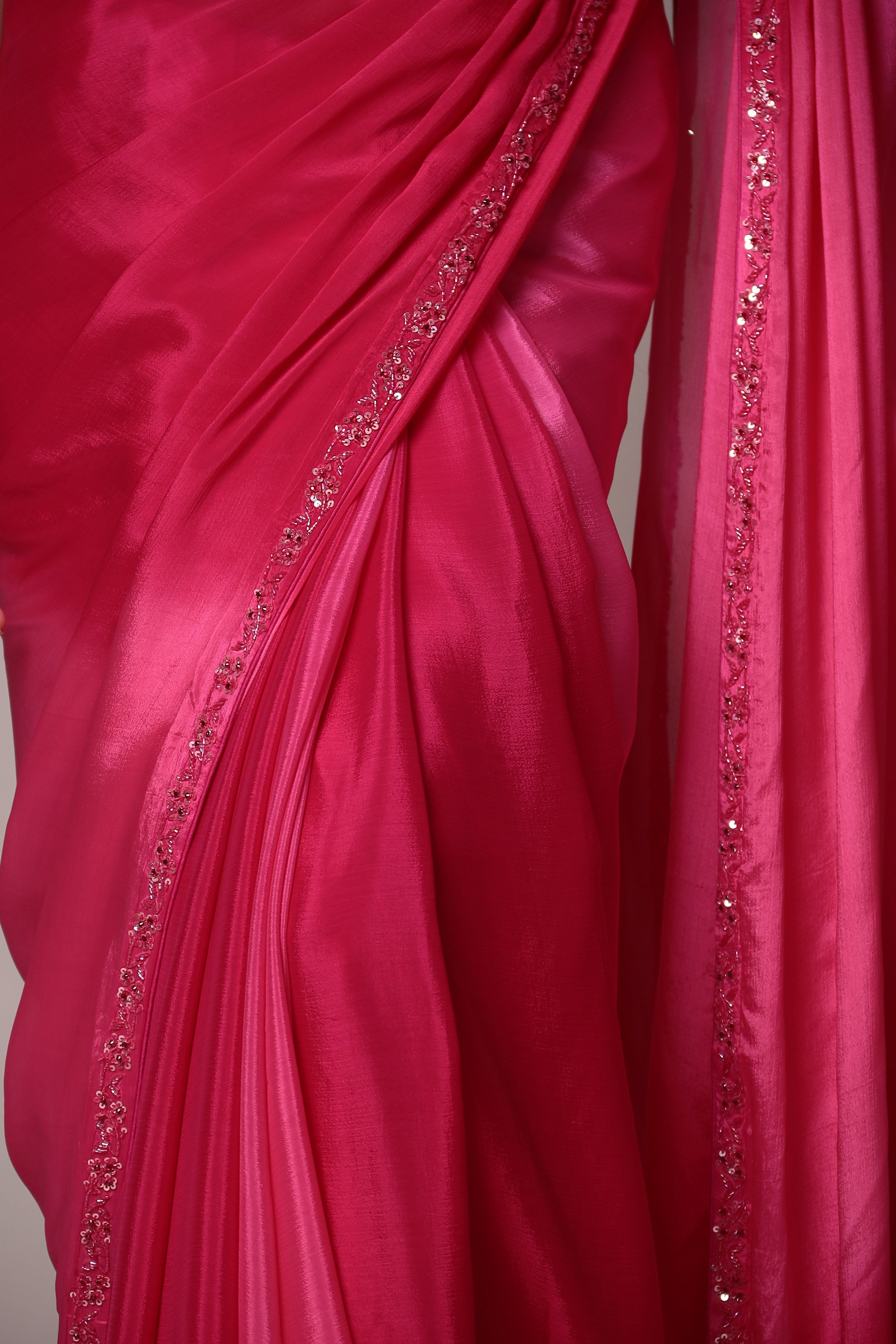 Exquisite Silk Saree adorned with intricate Cutdana embellishments.
