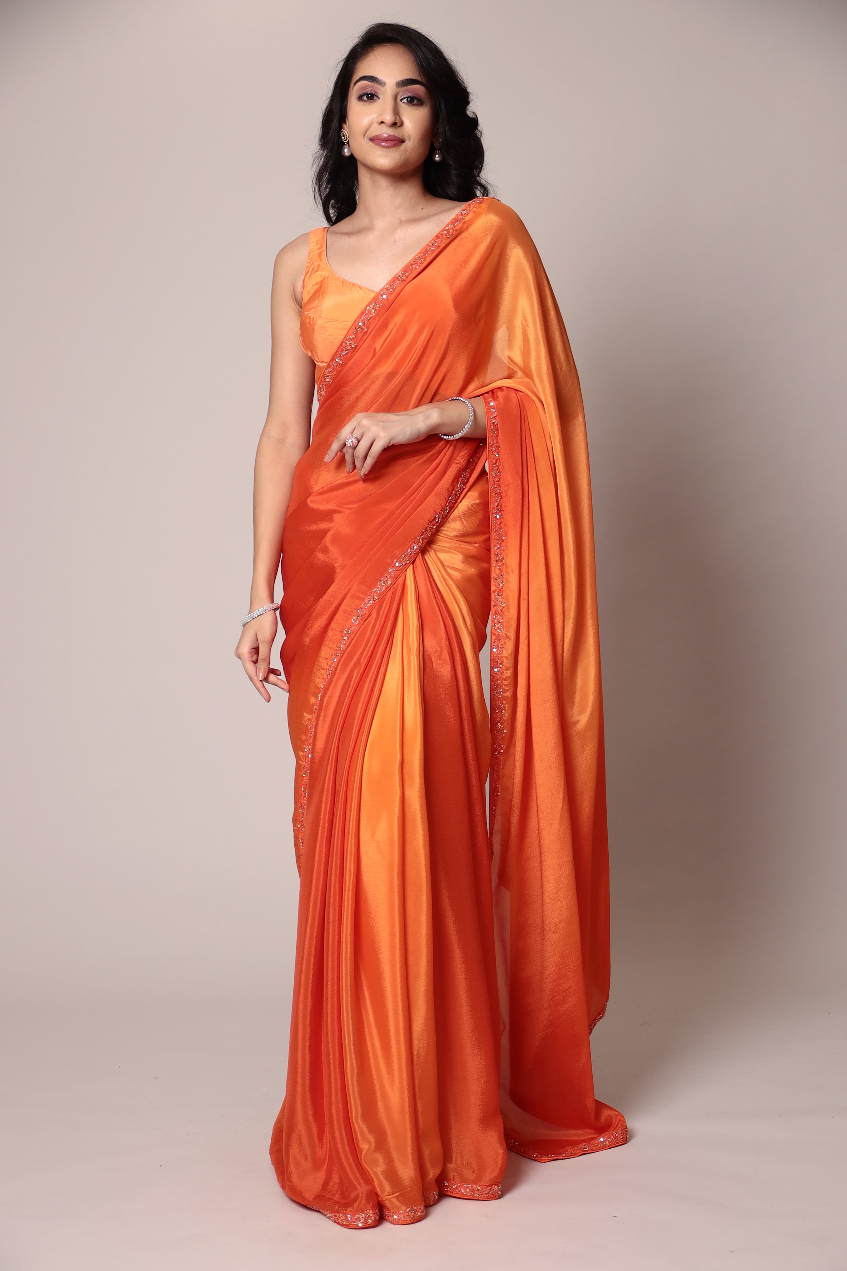 Exquisite Silk Saree adorned with intricate Cutdana embellishments.