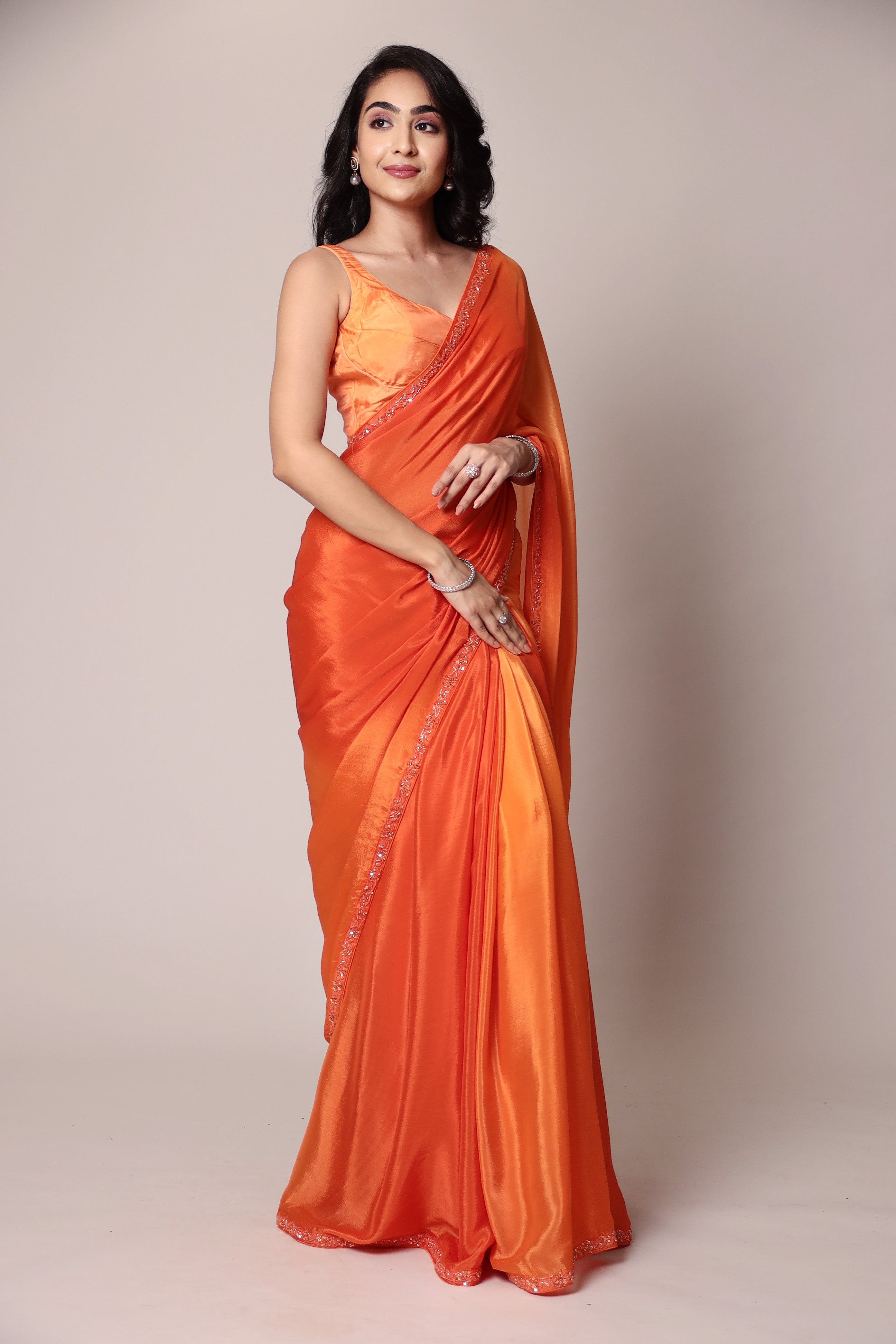 Exquisite Silk Saree adorned with intricate Cutdana embellishments.