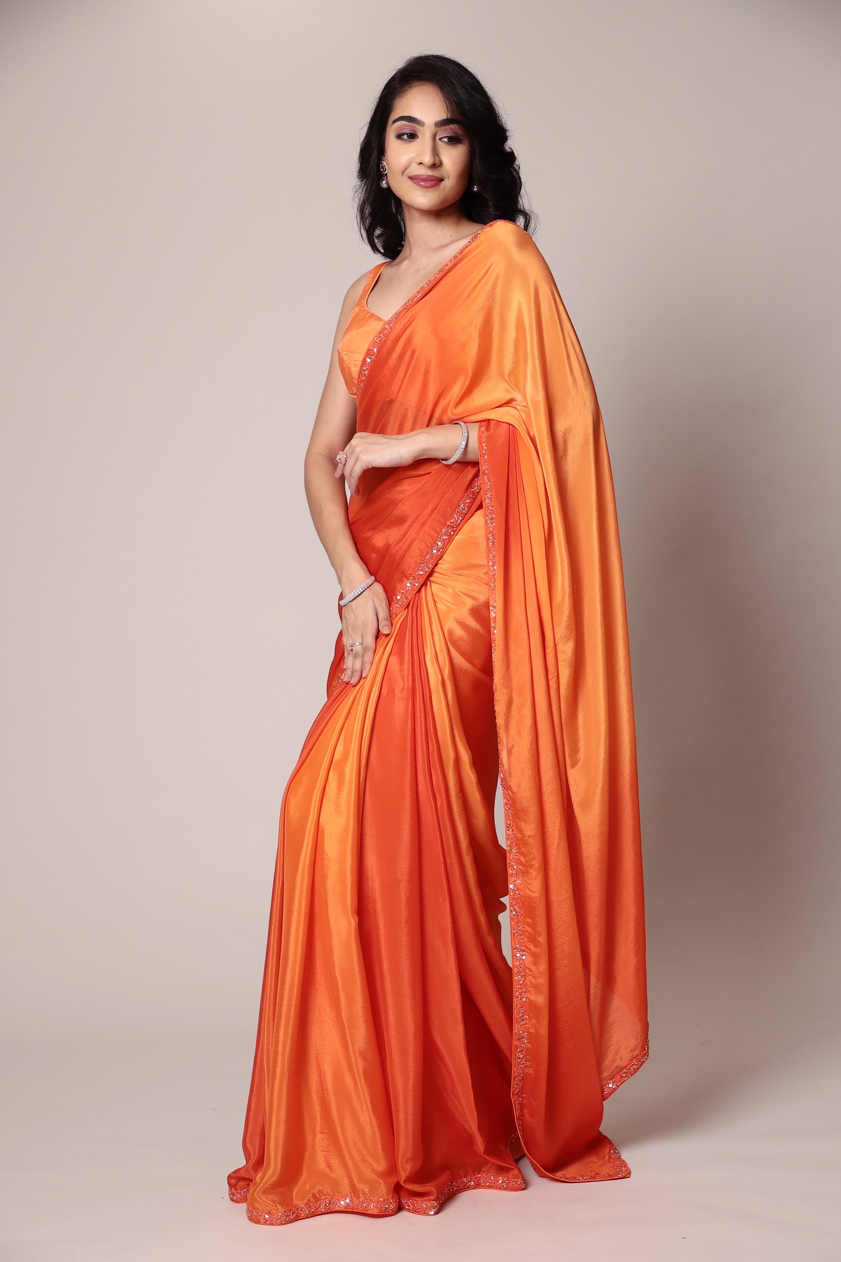 Exquisite Silk Saree adorned with intricate Cutdana embellishments.